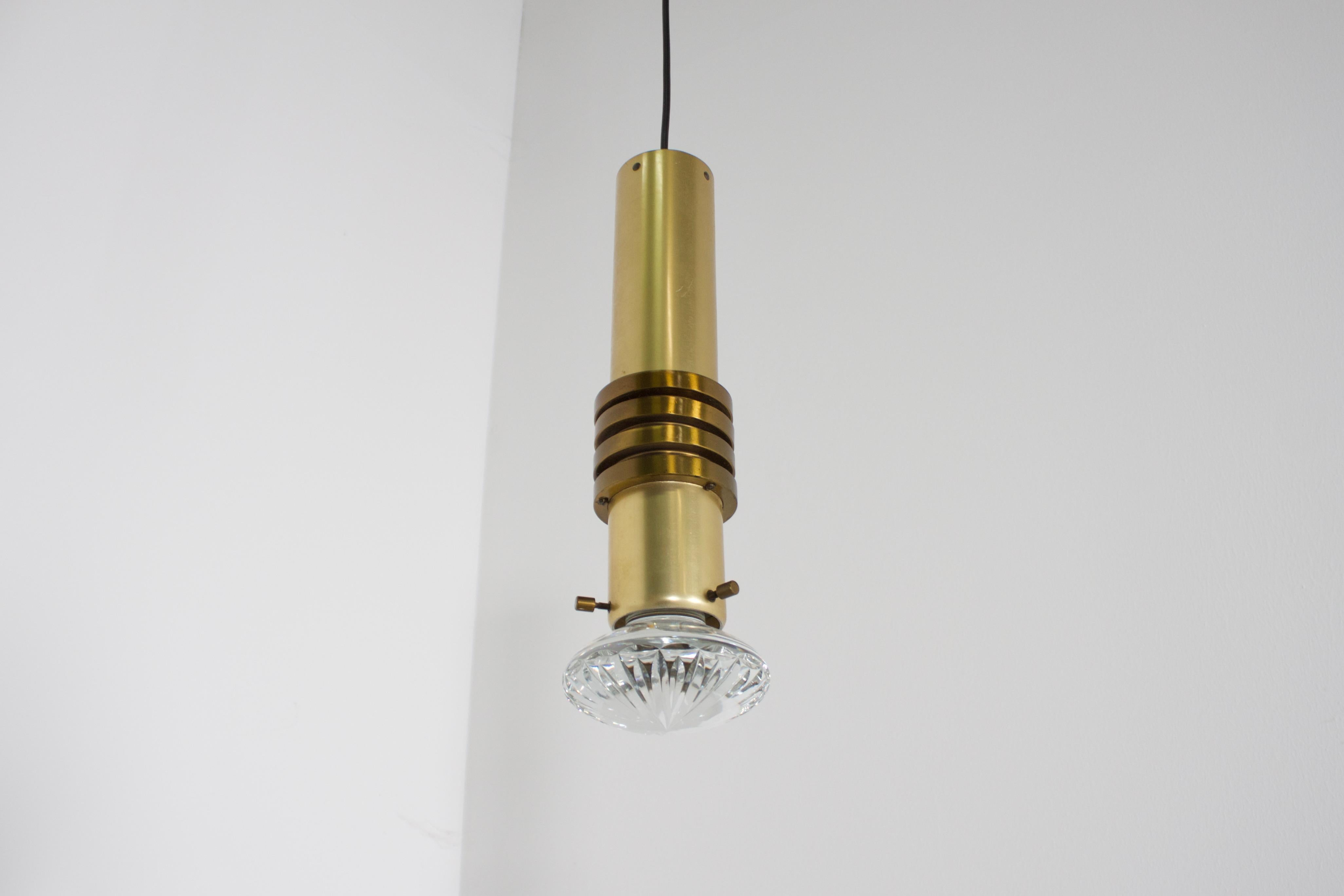 Mid-Century Modern Set of Brass Pendants with a Solid Glass Lens, Netherlands, 1970s For Sale