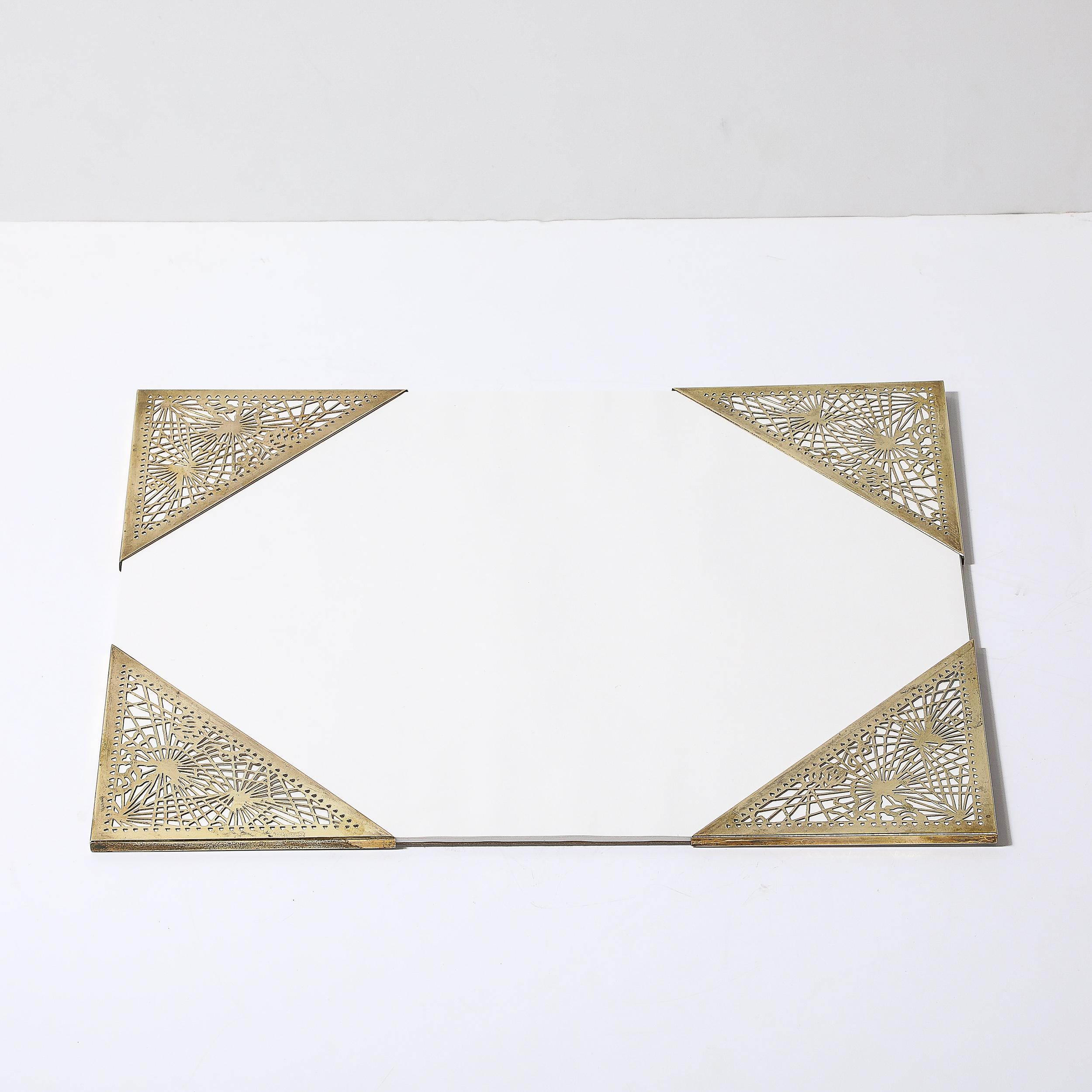 This beautifully made Set of Bronze Blotter Corners in the Pine Needle Pattern by Tiffany Studios originates from the United States, Circa 1915. They feature a beautiful cutout pattern of overlapping geometric motifs and natural influences with