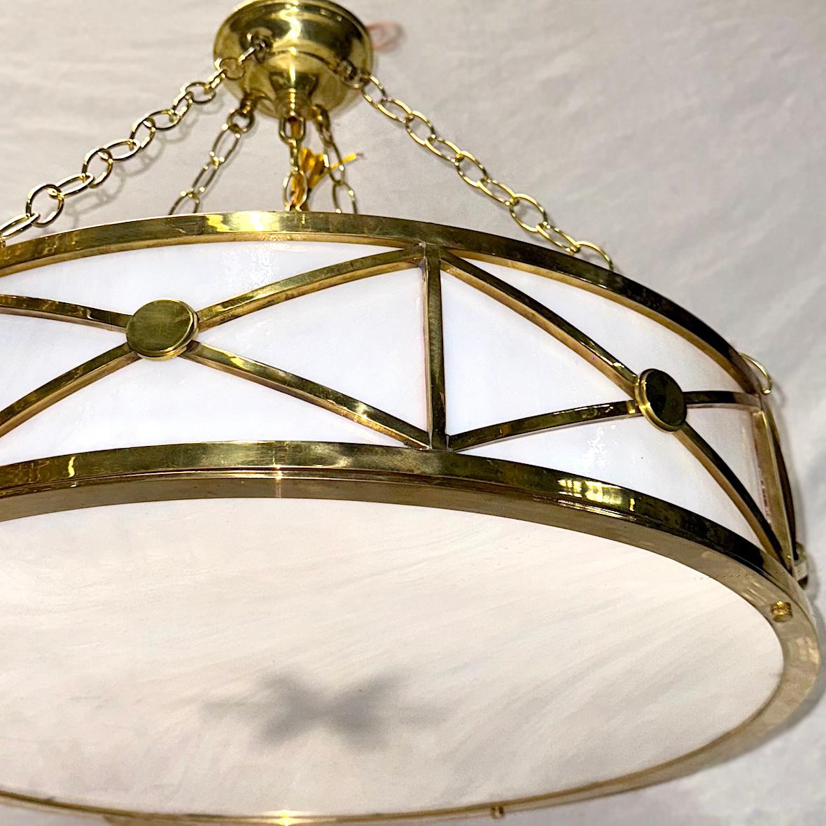 Milieu du XXe siècle Ensemble de luminaires en bronze et verre dépoli, vendus individuellement en vente