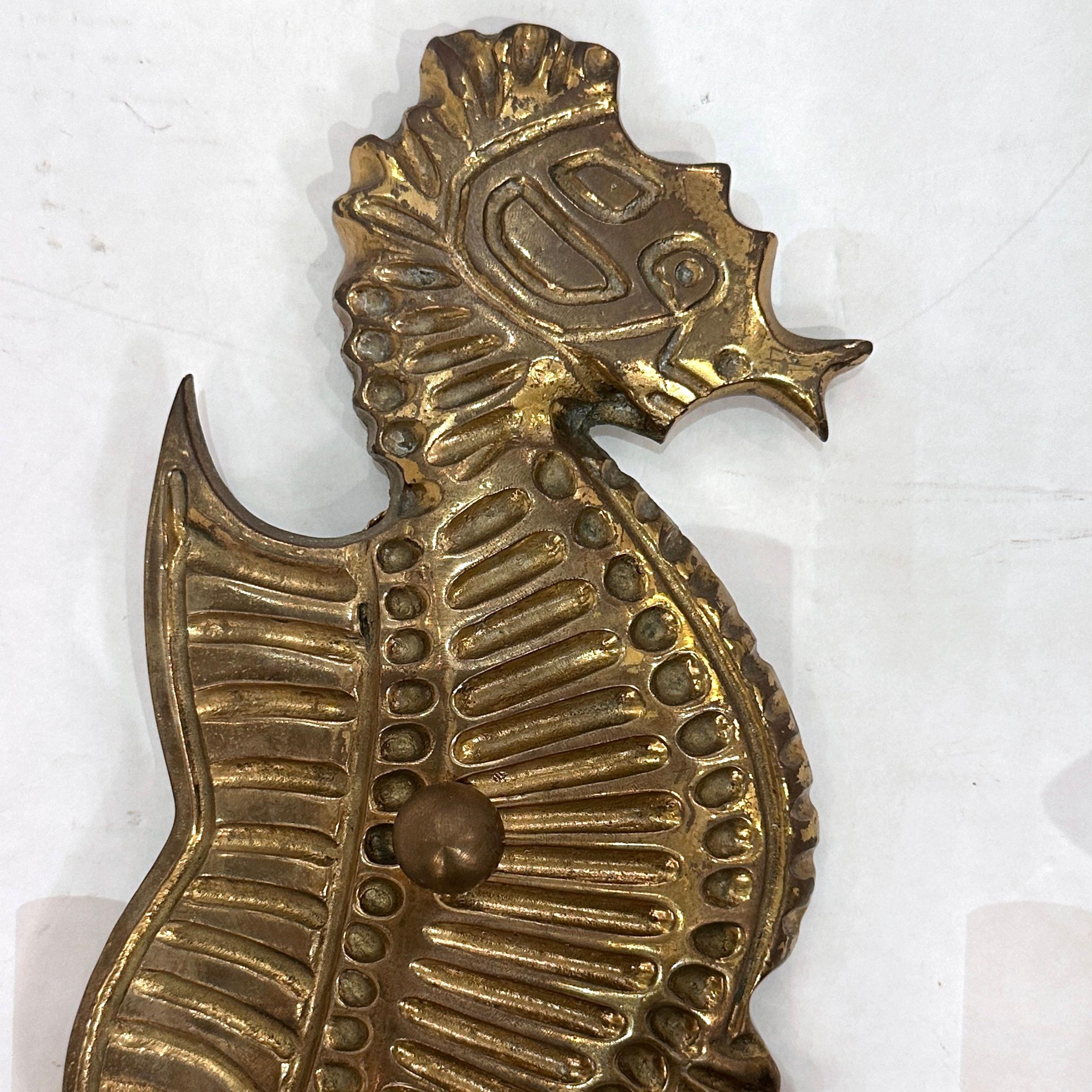 Set of Bronze Sea Horse Sconces, Sold per Pair In Good Condition For Sale In New York, NY