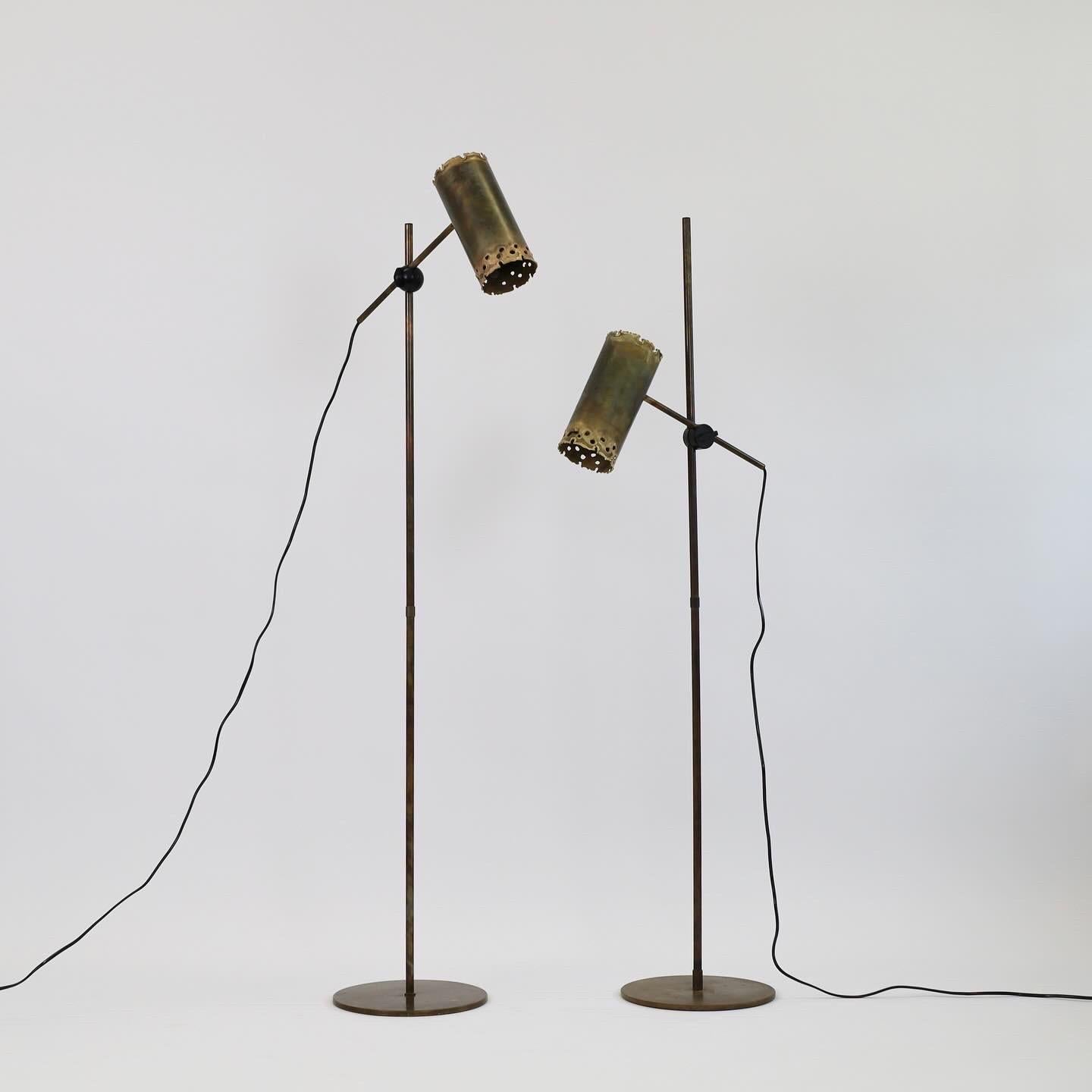 Rare set of brutalist flame-cut brass floor lamps designed Svend Aage Holm Sørensen in the 1960s. True eye-catchers for an exquisite place.  

* Set of flame-cut brass floor lamp with an adjustable shades
* Designer: Svend Aage Holm Sorensen
*