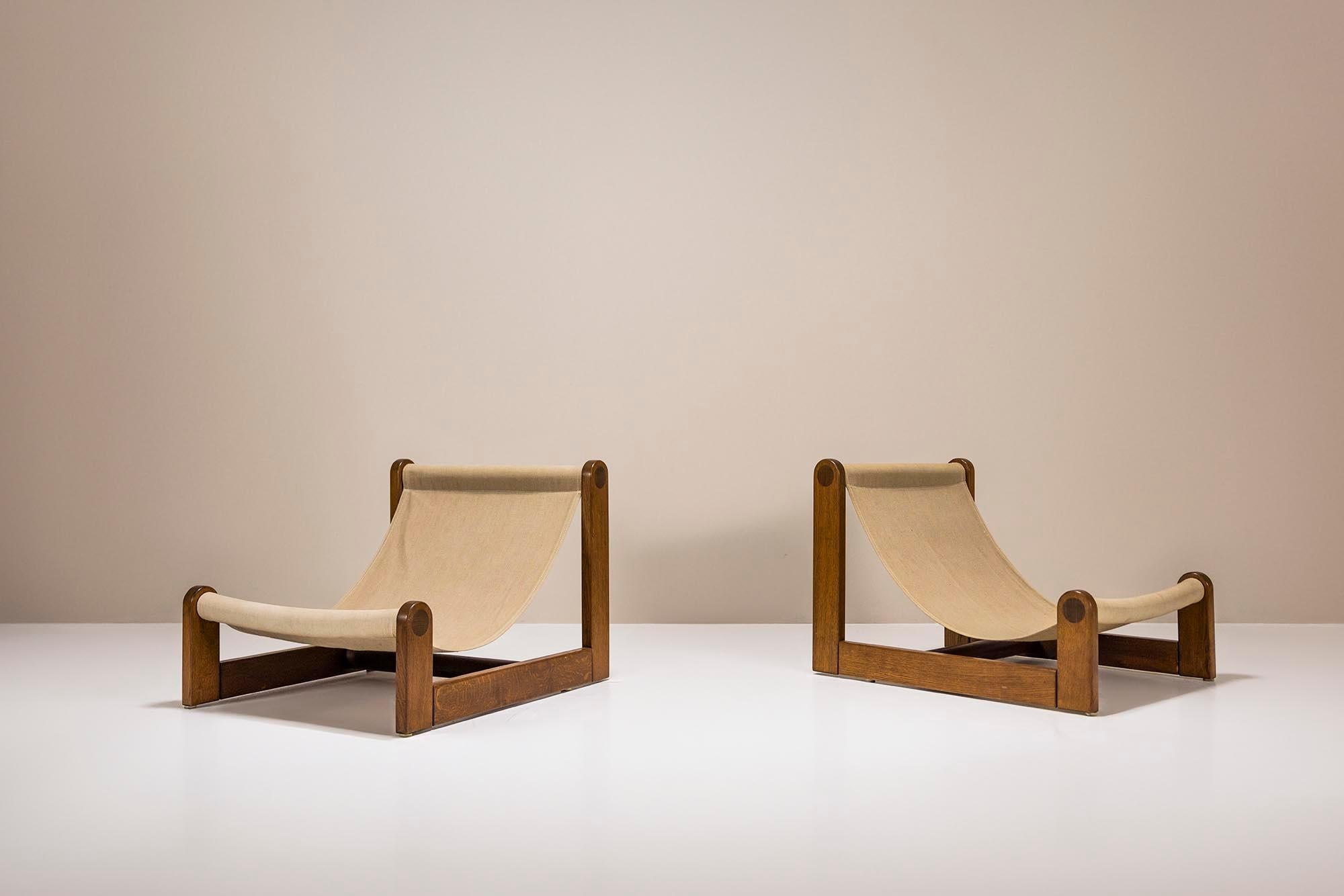 These sling chairs are the perfect embodiment of mid-century modern design. A combination of robust wood and elegant aesthetics. Crafted with a sturdy oak frame, the chairs offer a perfect balance between strength and sophistication.

Design
The