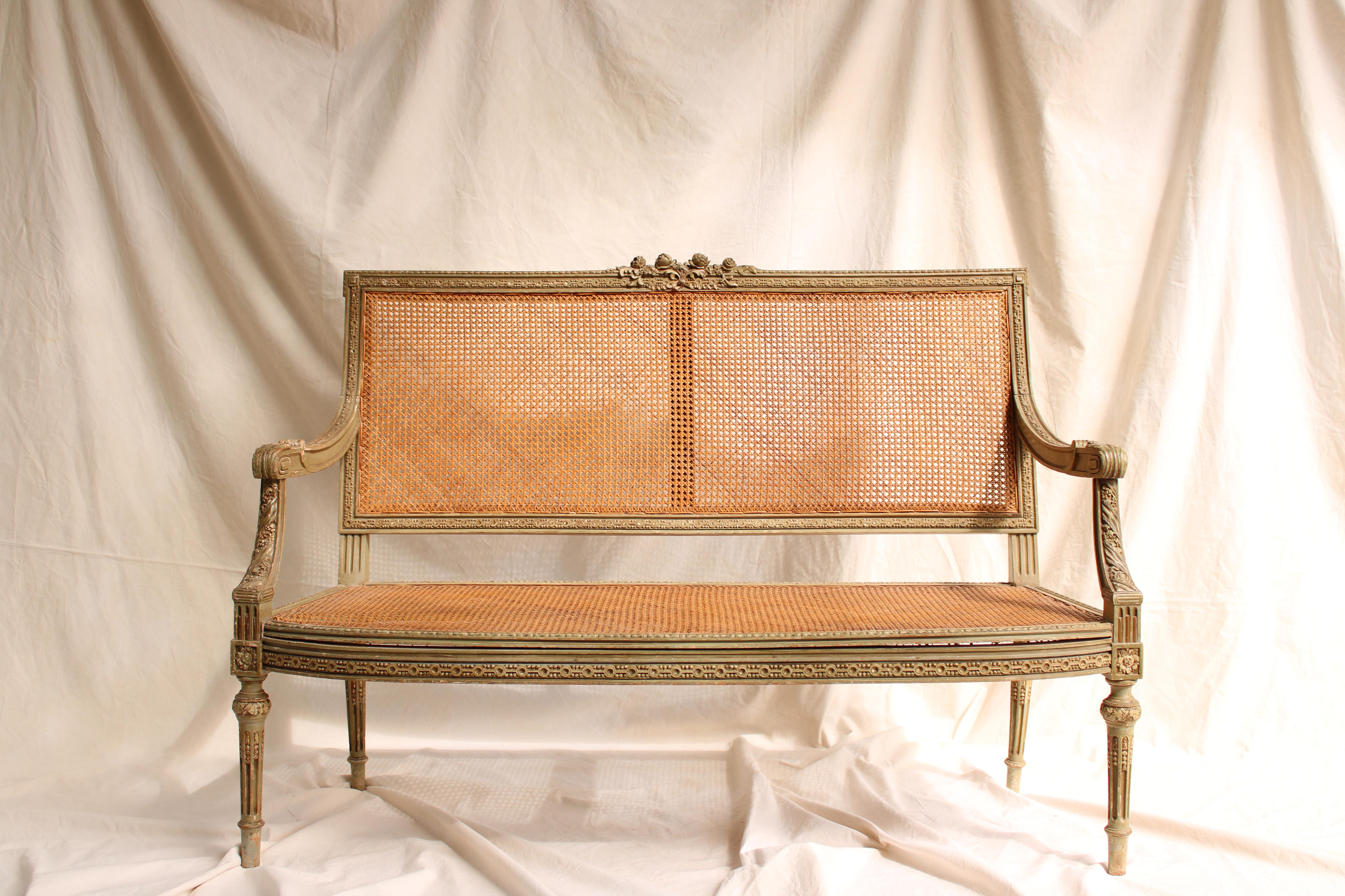 Set of Canapé and two Louis XVI style armchairs in carved wood and painted in green. Straw back and seat. 19th century France

Measurements of Canapé D.53.5 W.133 H.95 SH.37.5 cm.