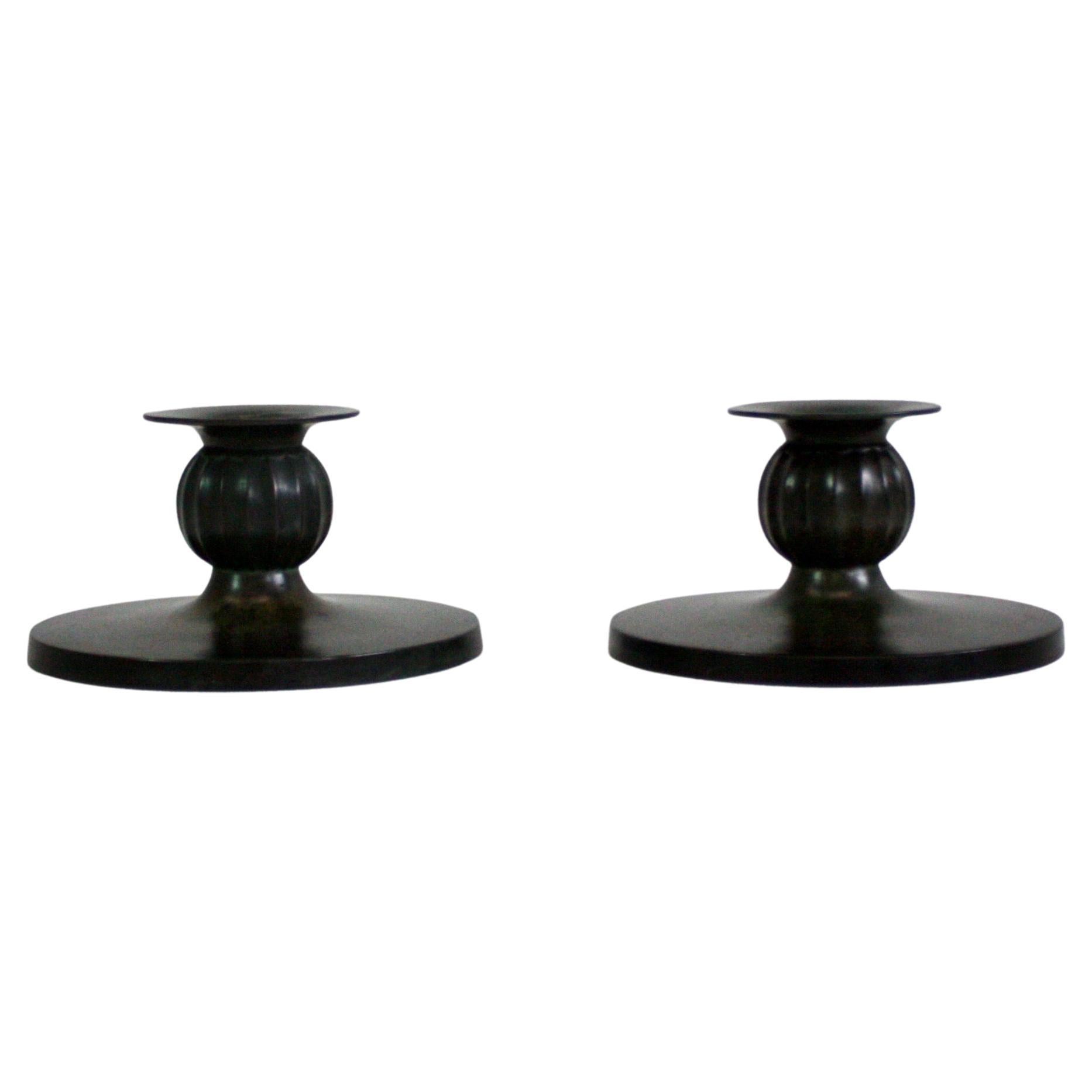 Set of Just Andersen candle holders, 1930s, Denmark