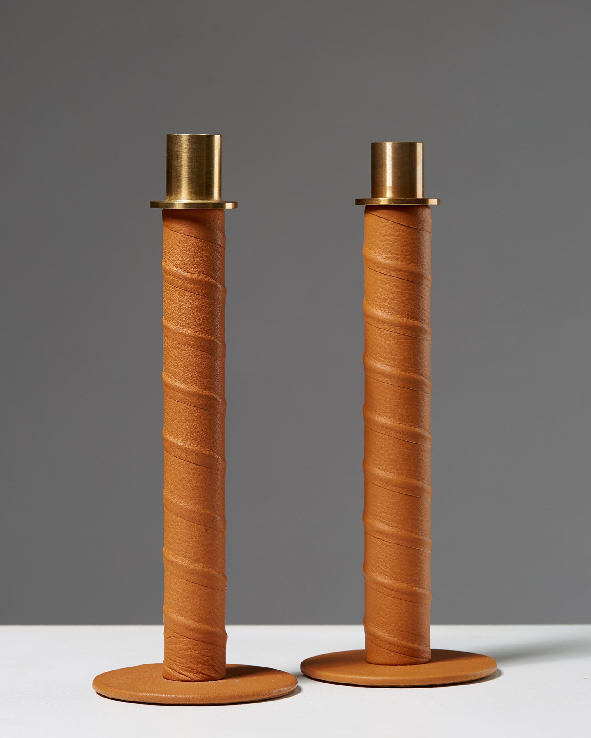 Set of candlesticks “Herrgård” designed by Alexander Lervik, Sweden, 2013.
Steel, leather and brass.

Measures: H 19 cm/ 7 3/8