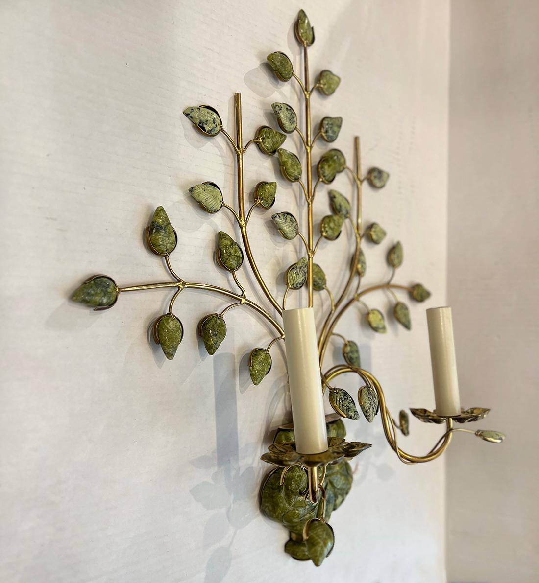 Set of 4 French 1960's jadeite sconces with leaves and vase motif. Sold per pair.

Measurements:
Height:21
