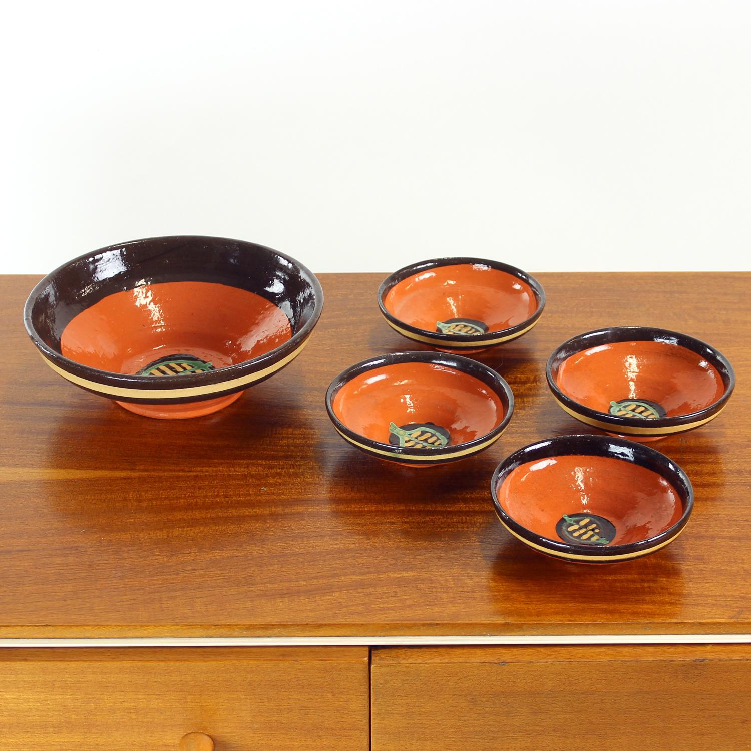 Beautiful set of ceramic bowls by a ceramic artist Ditta Abrhamova. She lived in Slovakia and apart from being a teacher, she used to create ceramic items as her hobby. She has shown at several exhibitions and has made her name in the world of