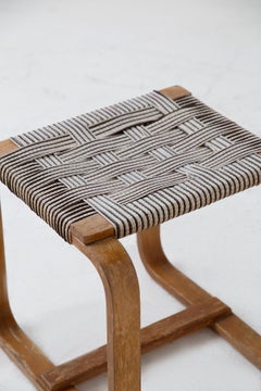 Set of chairs and ottoman by Giuseppe Pagano