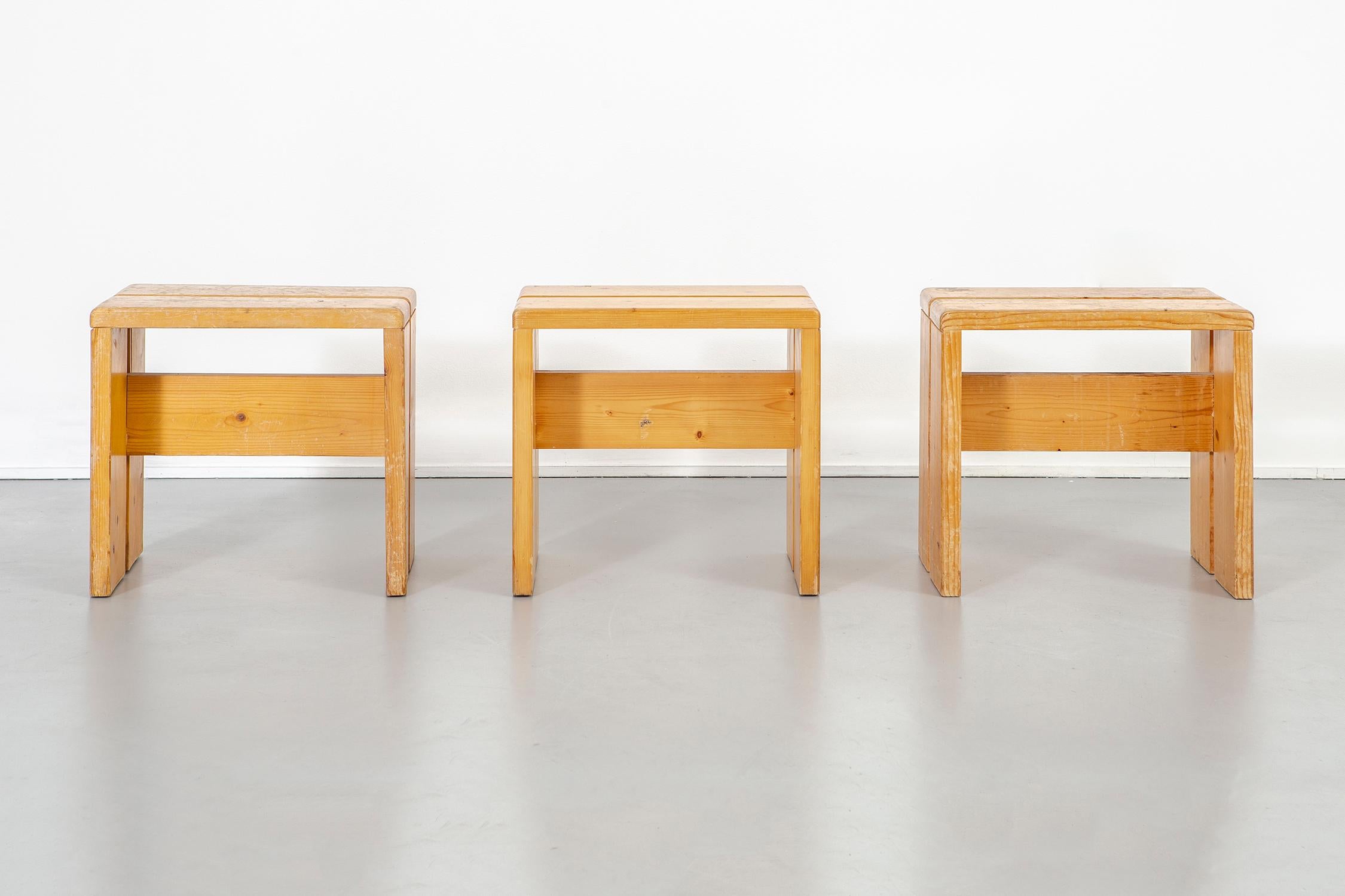 Set of three stools

designed by Charlotte Perriand for Les Arcs.

France, circa 1968.

Pine

Measures: 16 ¾” H x 16 ¾” W x 11 ?” D x seat 16 ¾” H.

Pictured with the corresponding dining table, also available for purchase

Individual stools can be