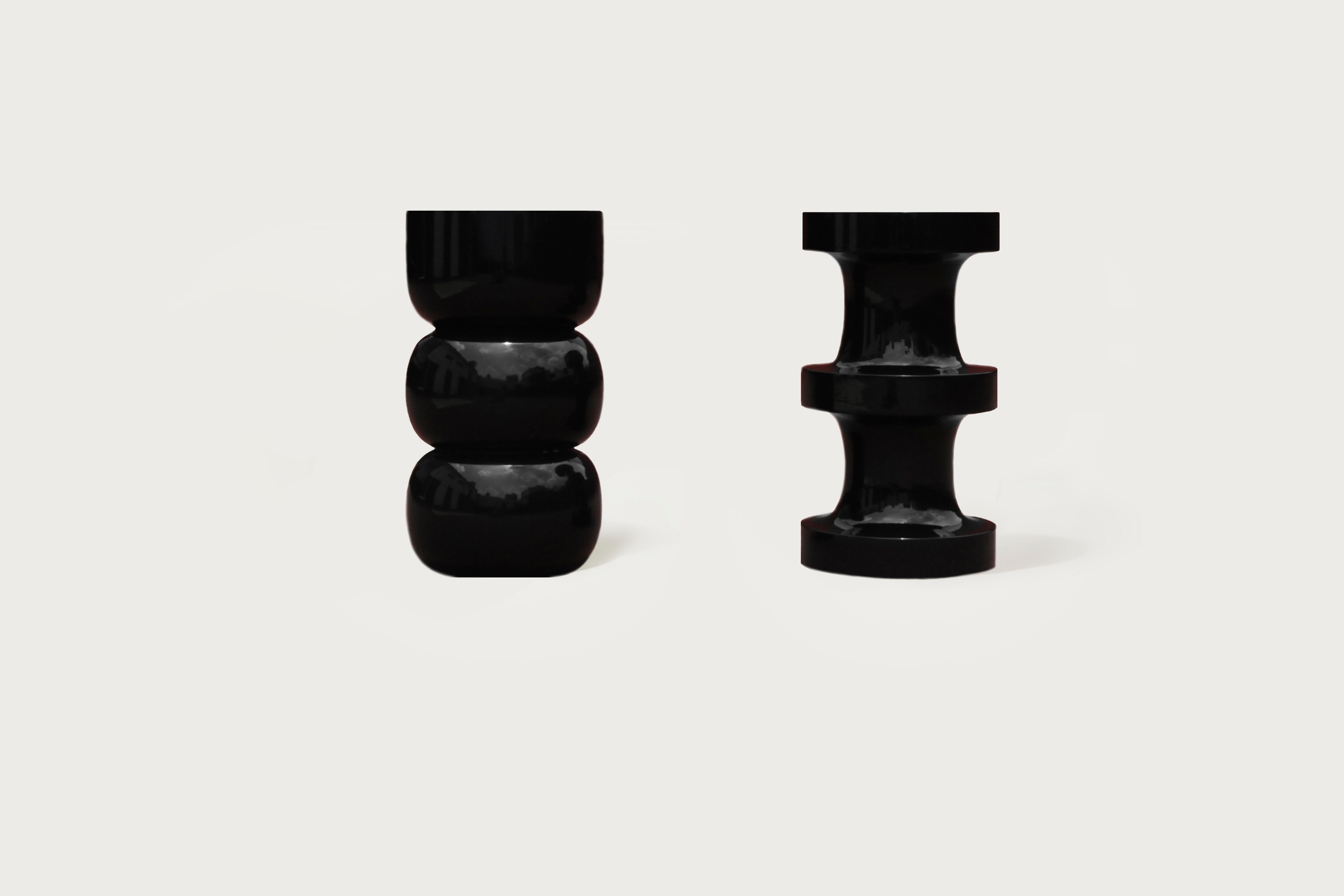 A set of chess piece stool and side table by Panorammma
Materials: wood, resin. 
Dimensions: 45 x 30 cm

Panorammma is a furniture design atelier based in Mexico City that seeks to redefine our relation to functional objects through