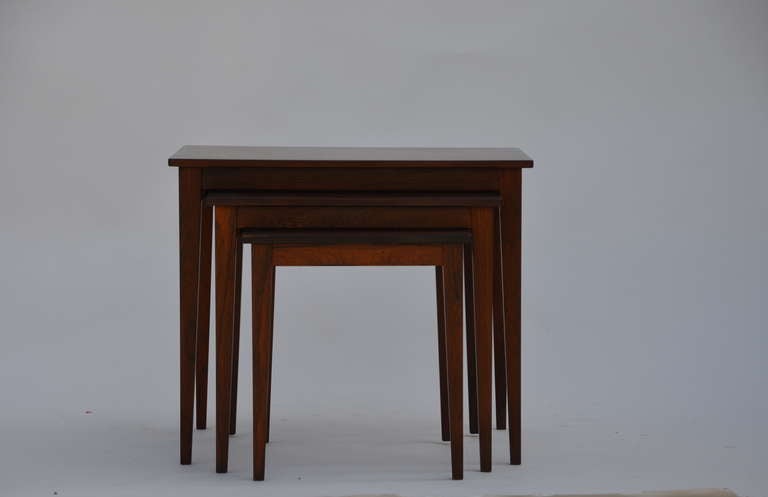 Set of chic Danish rosewood nesting tables.

Incredibly beautiful solid rosewood construction.

Very versatile and sturdy.
