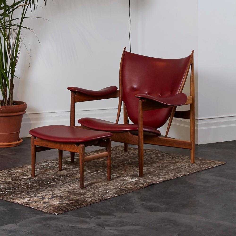 Chair designed by Finn Juhl in 1949, relaunched in 2002.
Chieftain footstool designed by Finn Juhl in 1953, relaunched in 2015.
Manufactured by House of Finn Juhl in Denmark.

The iconic Chieftain chair is one of Finn Juhl’s absolute