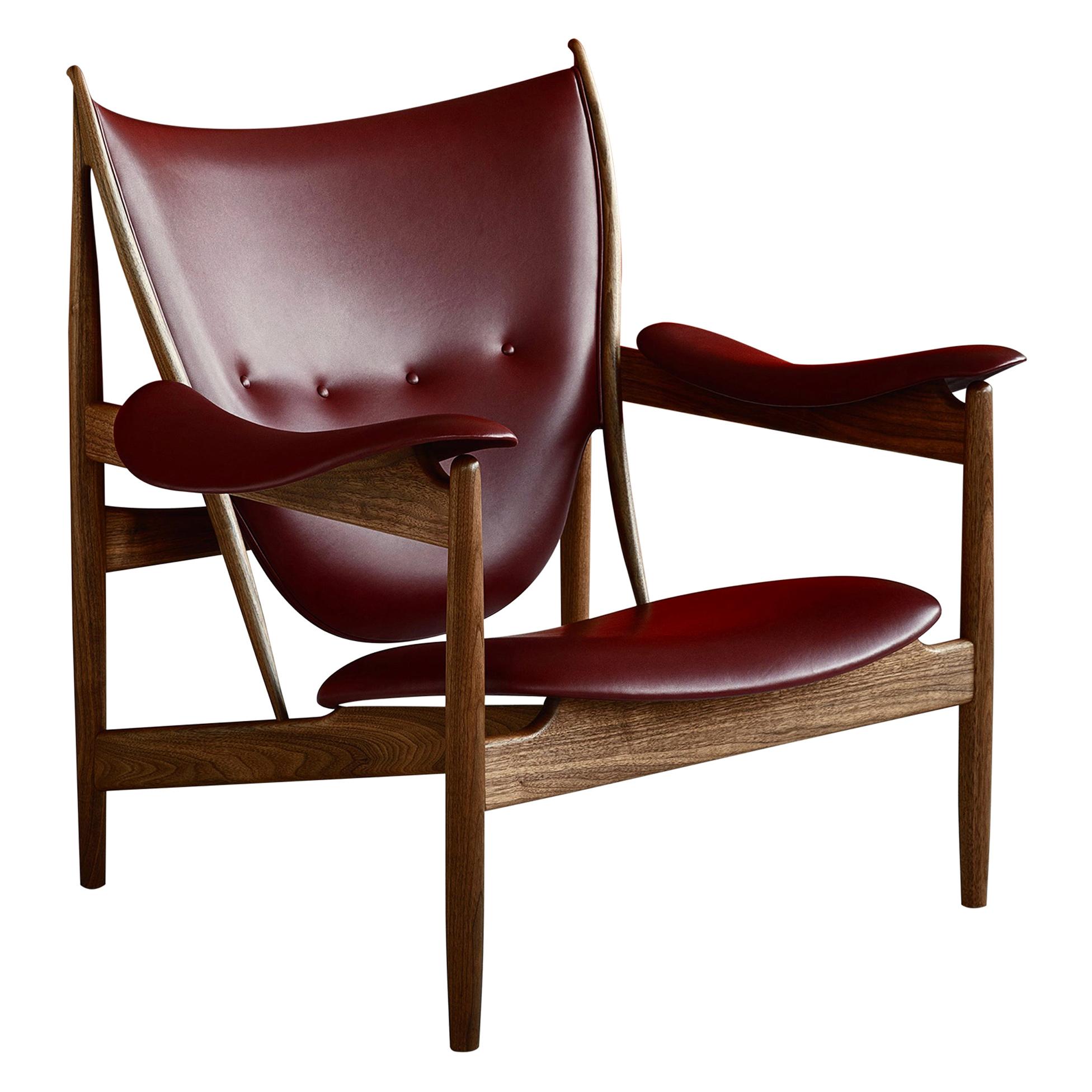 Modern Set of Chieftain Armchair and Chieftain Stool in Wood and Leather by Finn Juhl