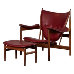 Set of Chieftain Armchair and Chieftain Stool in Wood and Leather by Finn Juhl