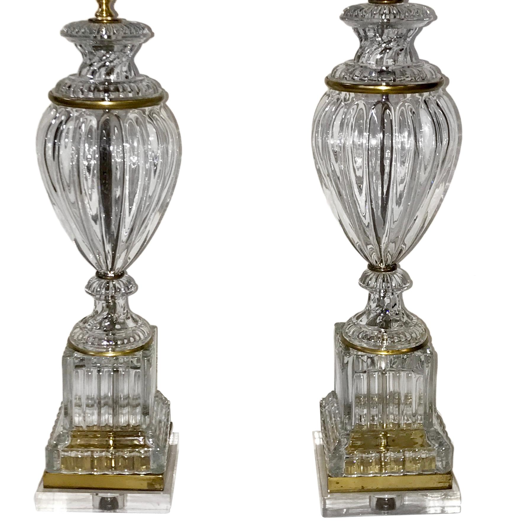 Set of 1940s French molded glass table lamps with gilt details, mounted on Lucite bases.
Several sets available.

Priced individually.

Measures: 23 height of body alone.