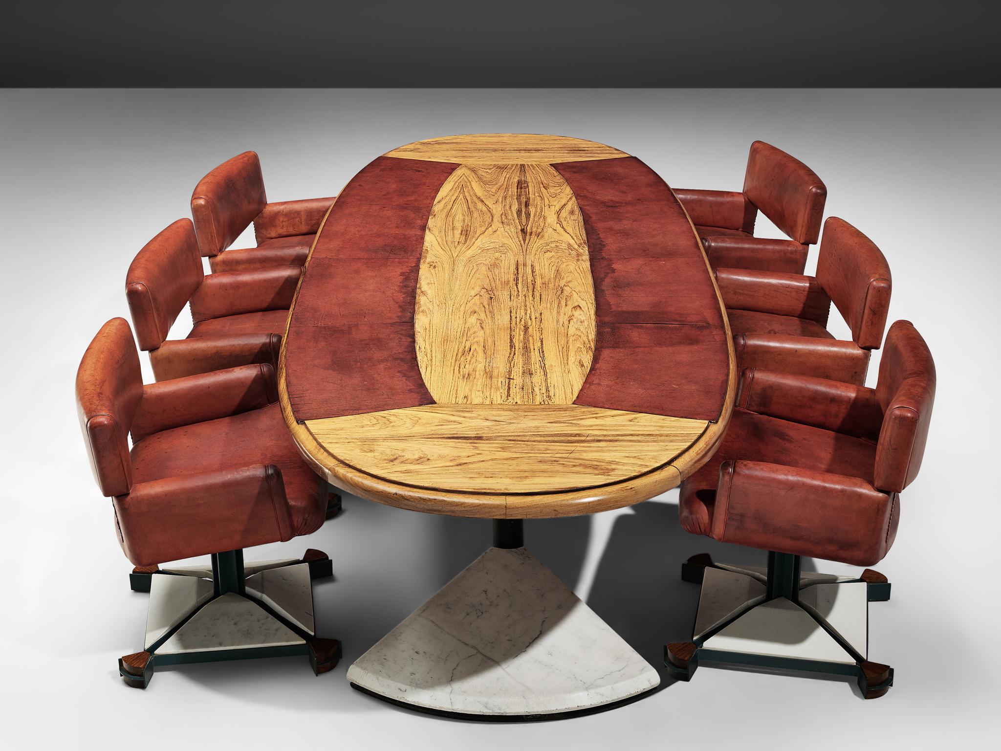 Set of conference table and six chairs, marble, walnut, metal, and leather, Italy, 1970s. 

Striking oval table that can be used as conference table or large dining table. Despite being made out of different materials, a beautiful balance is formed.