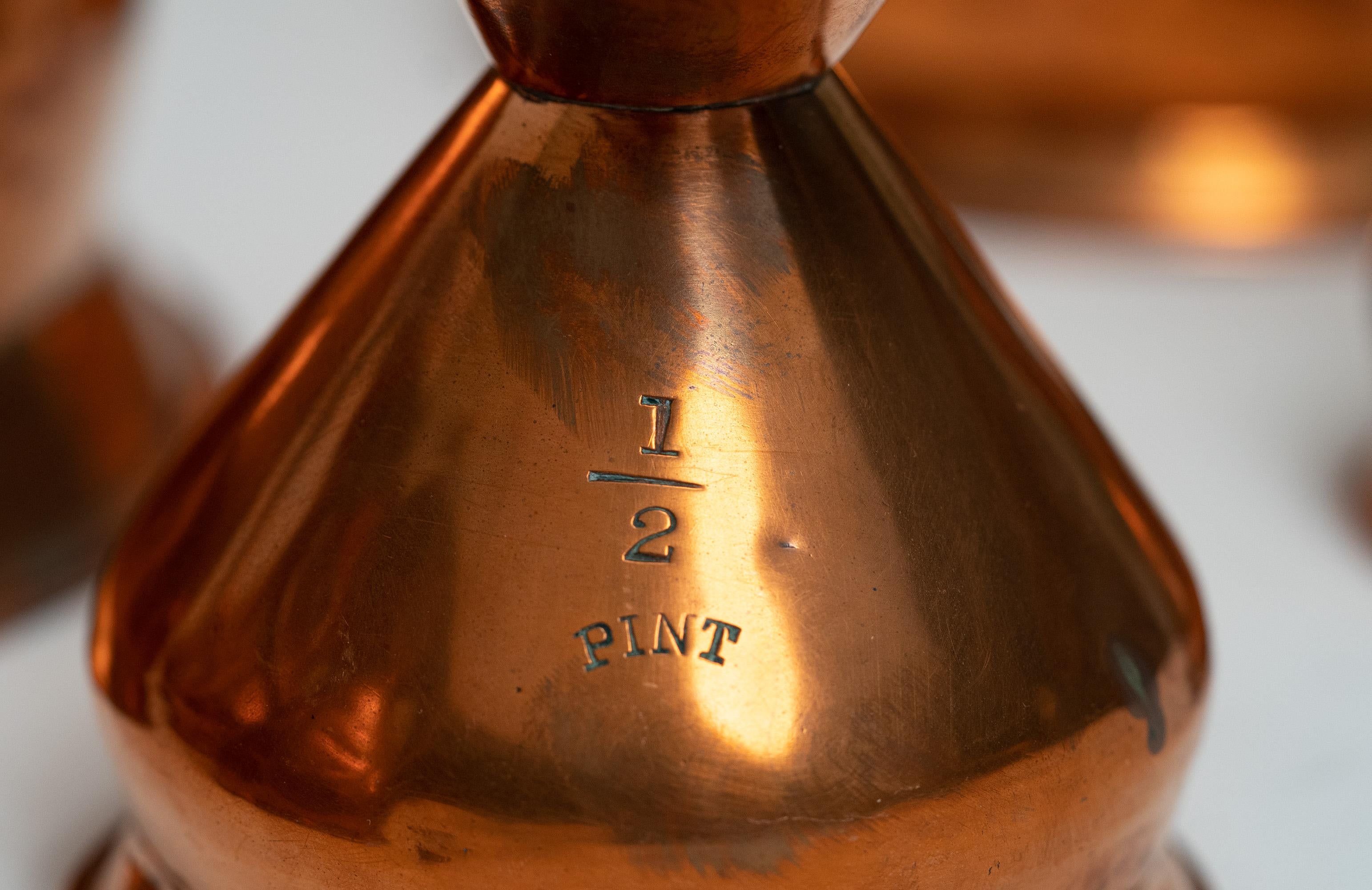 19th Century Set of Copper Measuring Cups For Sale