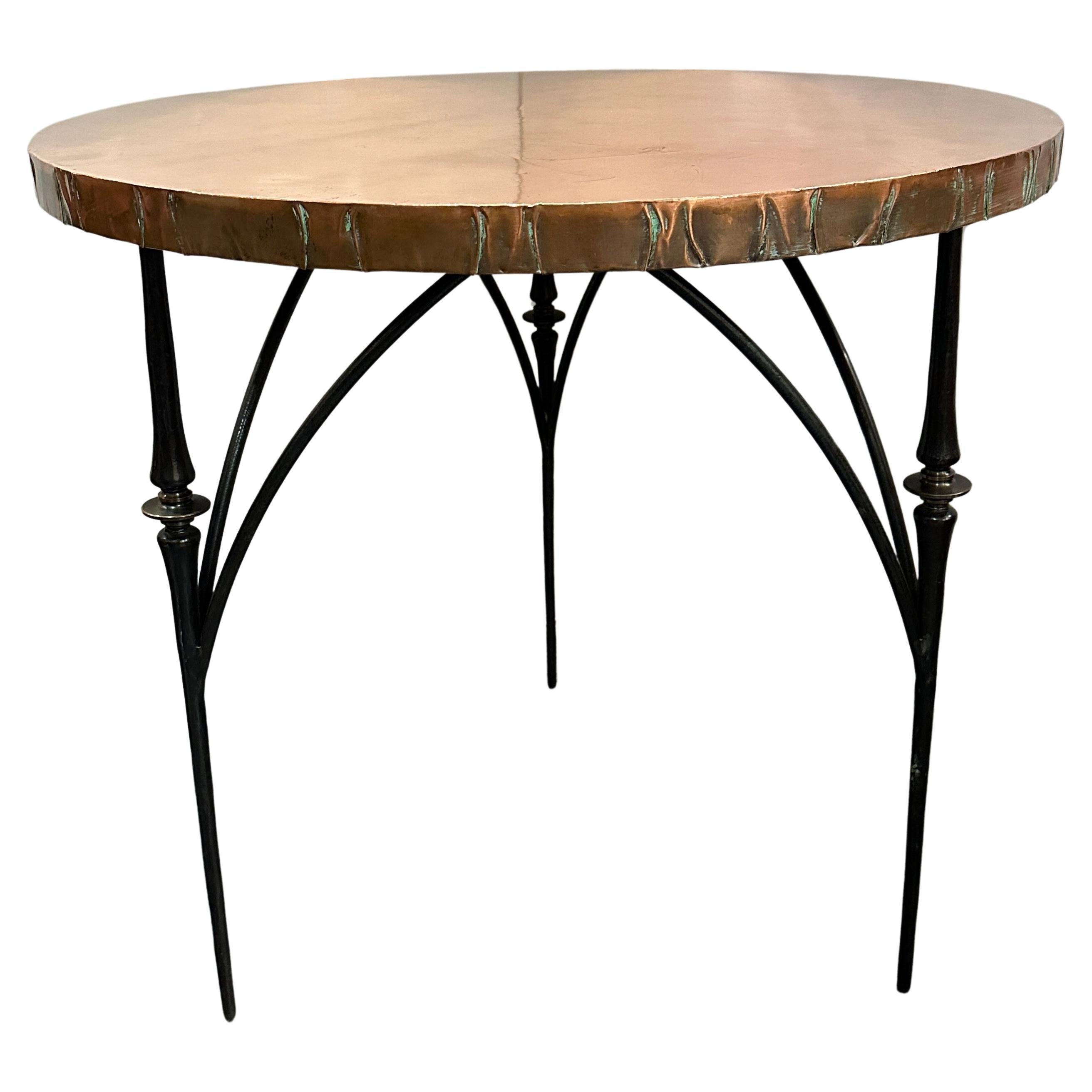 Pair of Continental, copper topped tables with patinated bronze legs and polished bronze detail.  Folded edges of copper create great interest and add depth to the apron.  Sold separately.