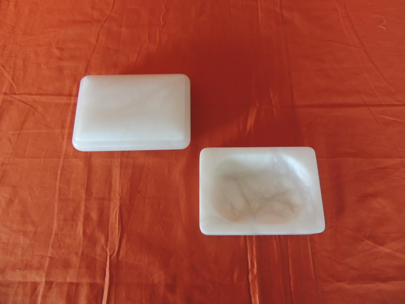 Hand carved set of covered box and soap dish Italian Alabaster decorative accessories.
These pieces could be use in the bathroom or on a vanity table.
