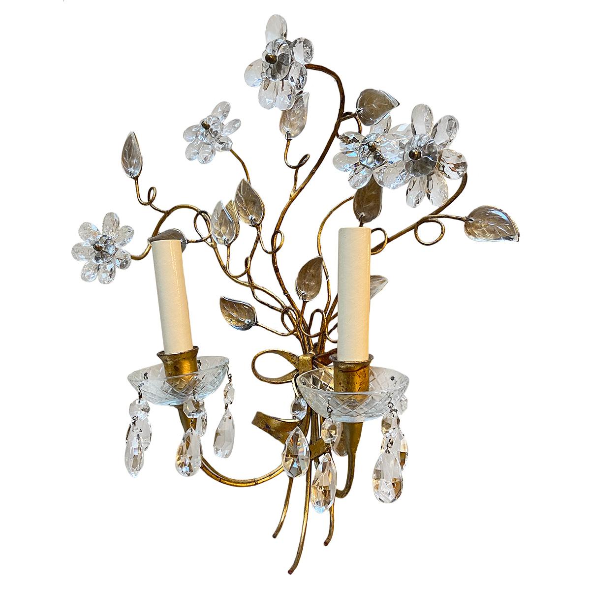 Set of four French circa 1940's gilt metal sconces shaped as a bouquet of crystal flowers and pendants. Sold per pair.

Measurements:
Height: 18