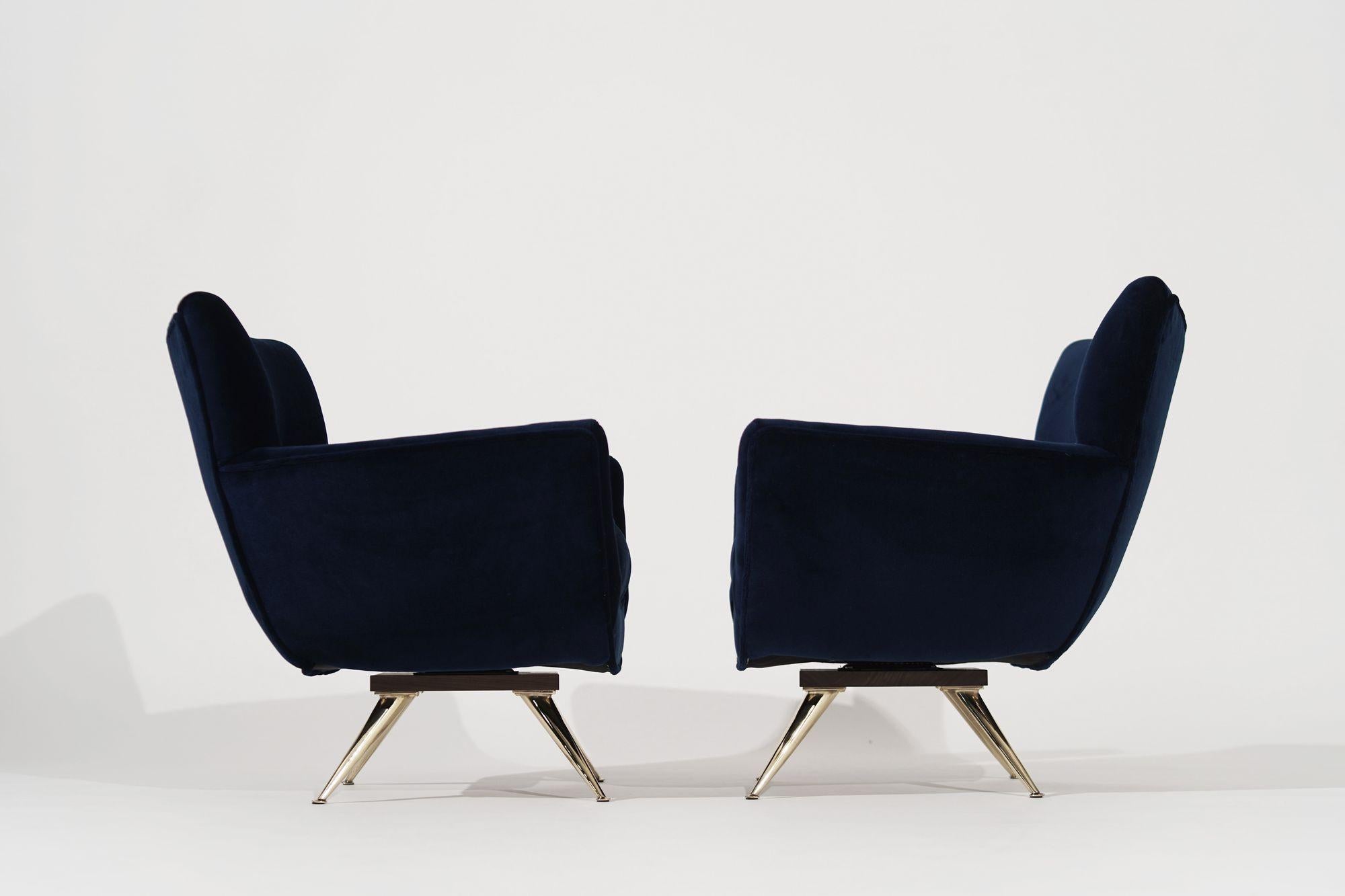 Pair of beautifully restored swivel chairs designed by Henry Glass in the 1950s, now available exclusively from Stamford Modern. These chairs have been expertly restored to their original condition, with a contemporary twist that will elevate any