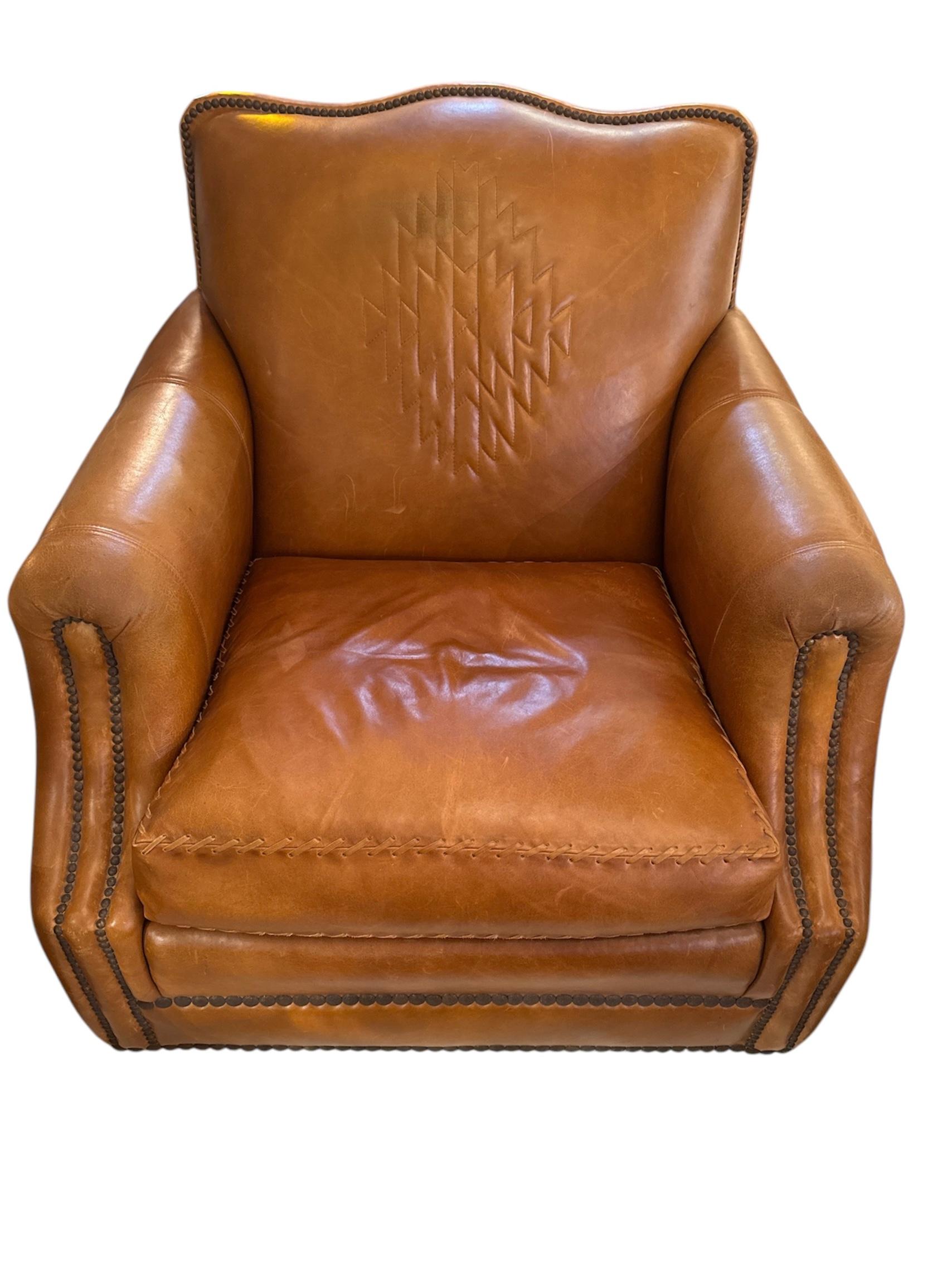Each swivel club chair is custom-made using the finest quality leather, hand-selected for its rich texture, depth of color, and durability. The supple leather is beautifully distressed, giving it a vintage patina that only improves with age, while