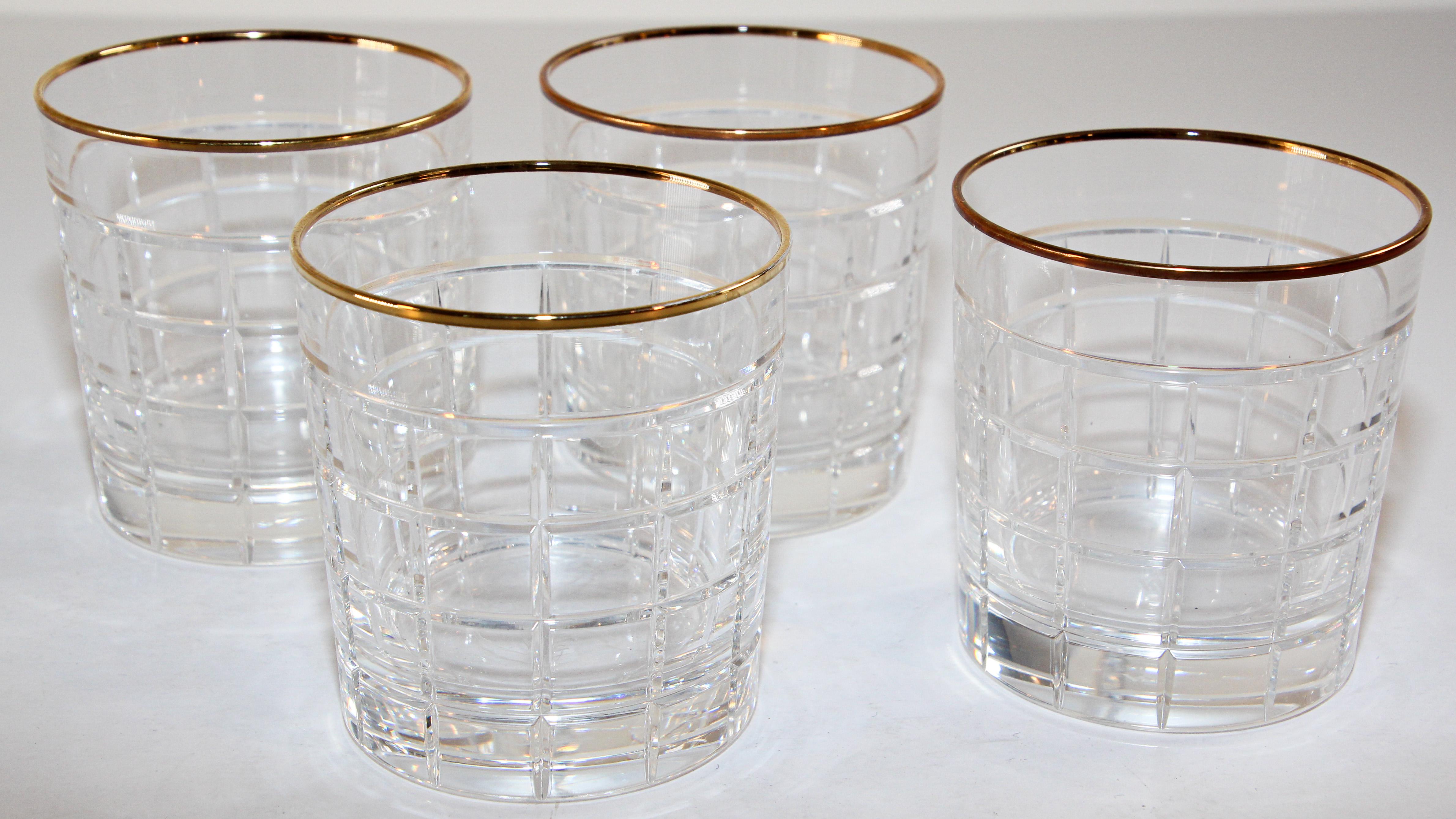 Set of four cut clear crystal rocks' double old-fashioned cocktail whiskey glasses by Ralph Lauren.
Set of 4 vintage rock whiskey or water barware, drinking glasses in beautiful clear cut crystal glass with gold rim.
Unique elegant barware