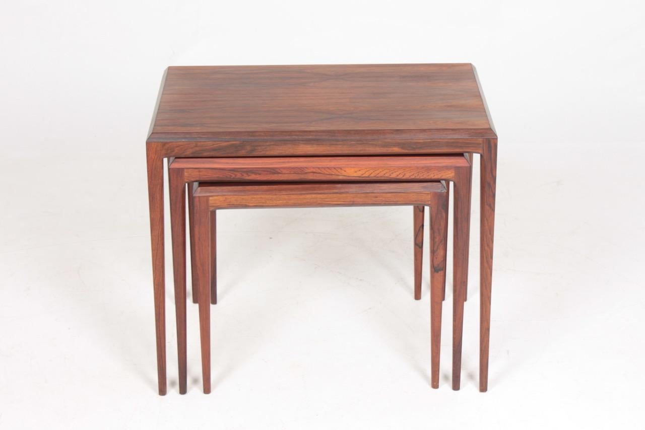 Set of nesting tables in rosewood designed by Maa. Johannes Andersen for CFC Furniture in 1960s. Great original condition.