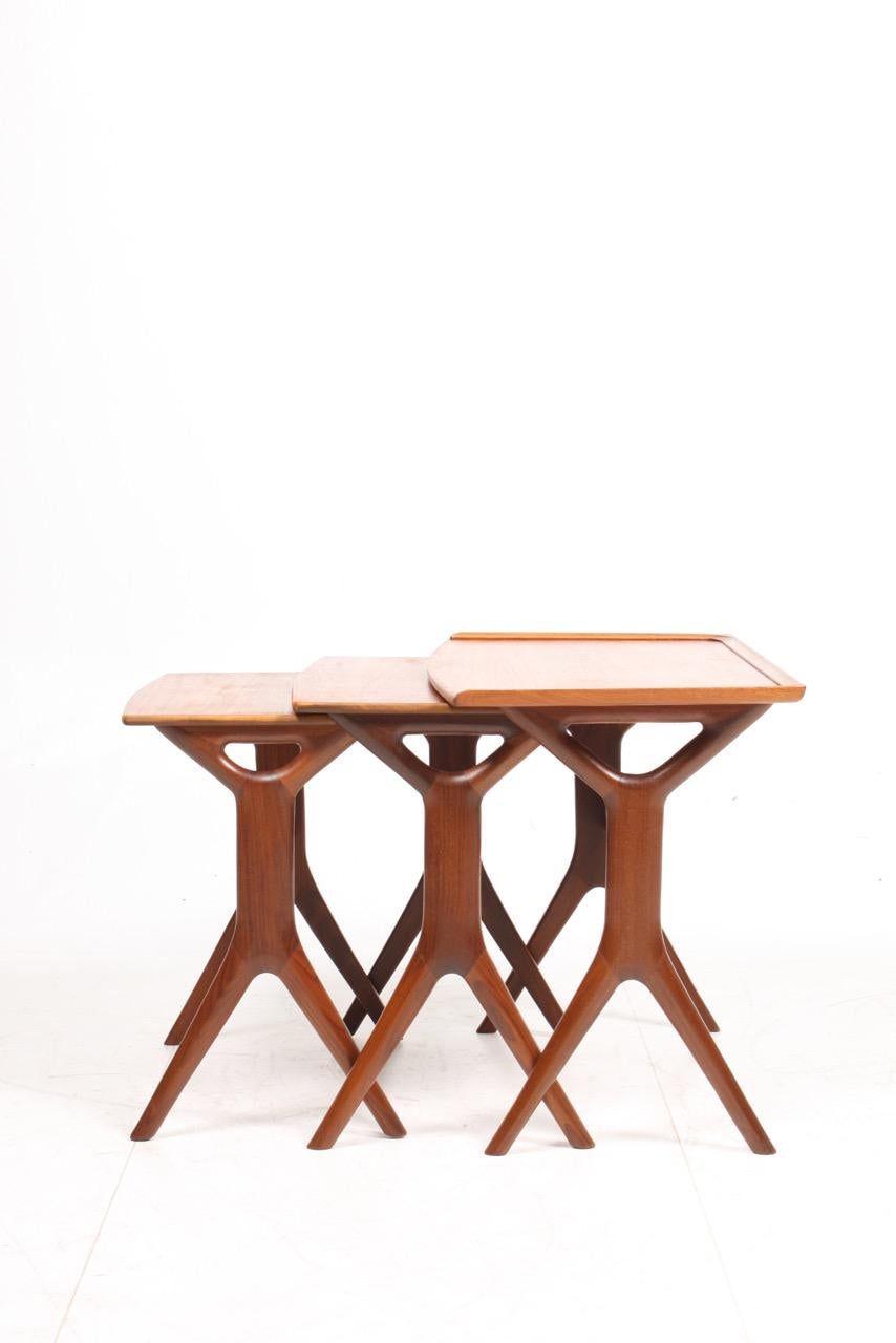 Set of nesting tables in teak designed by Maa. Johannes Andersen for CFC Furniture in 1960s. Great original condition.
