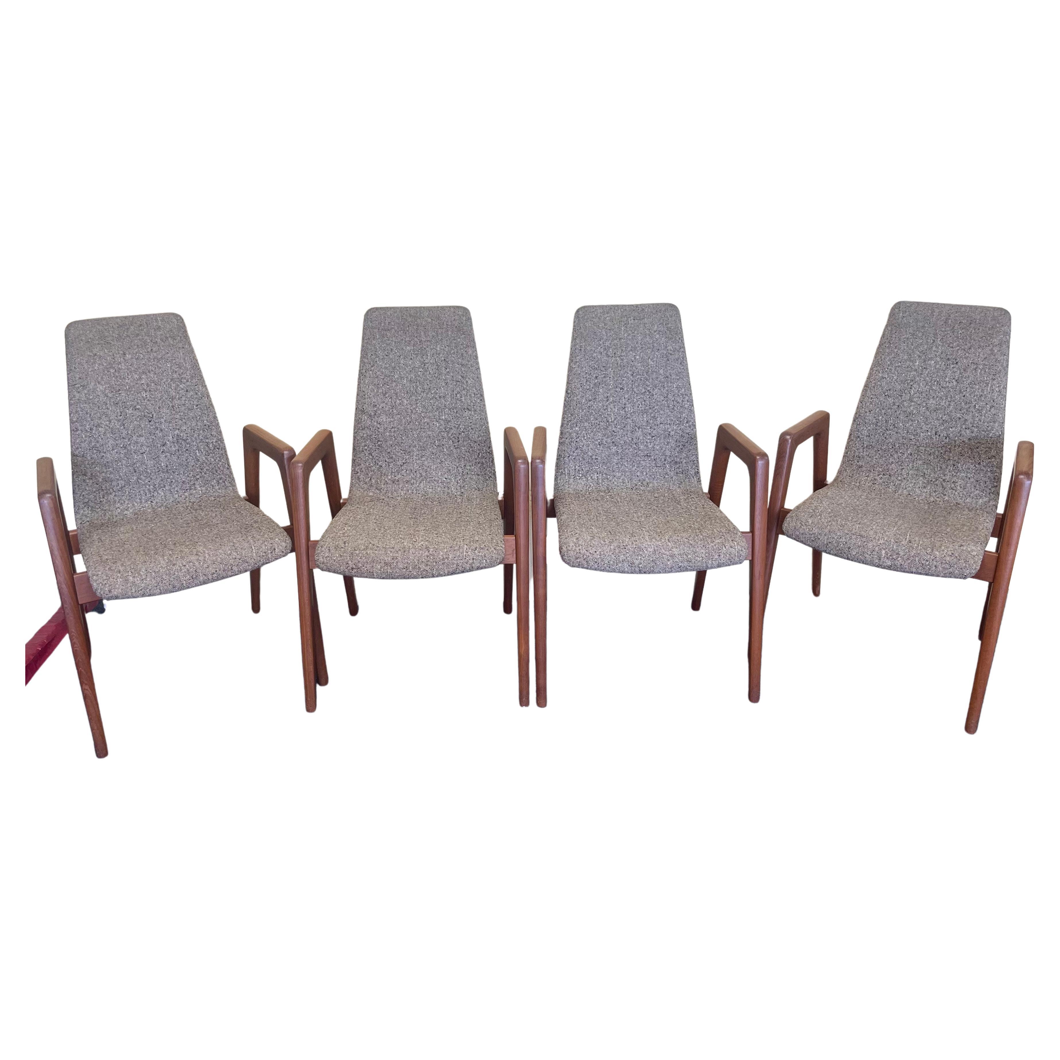 A very rare set of four Danish modern solid teak dining chairs by Kai Kristiansen for V. Shou Andersen of Denmark, circa 1960s. I have not been able to locate a similair set of chairs online; we beleive they are quite rare with both an upholstered