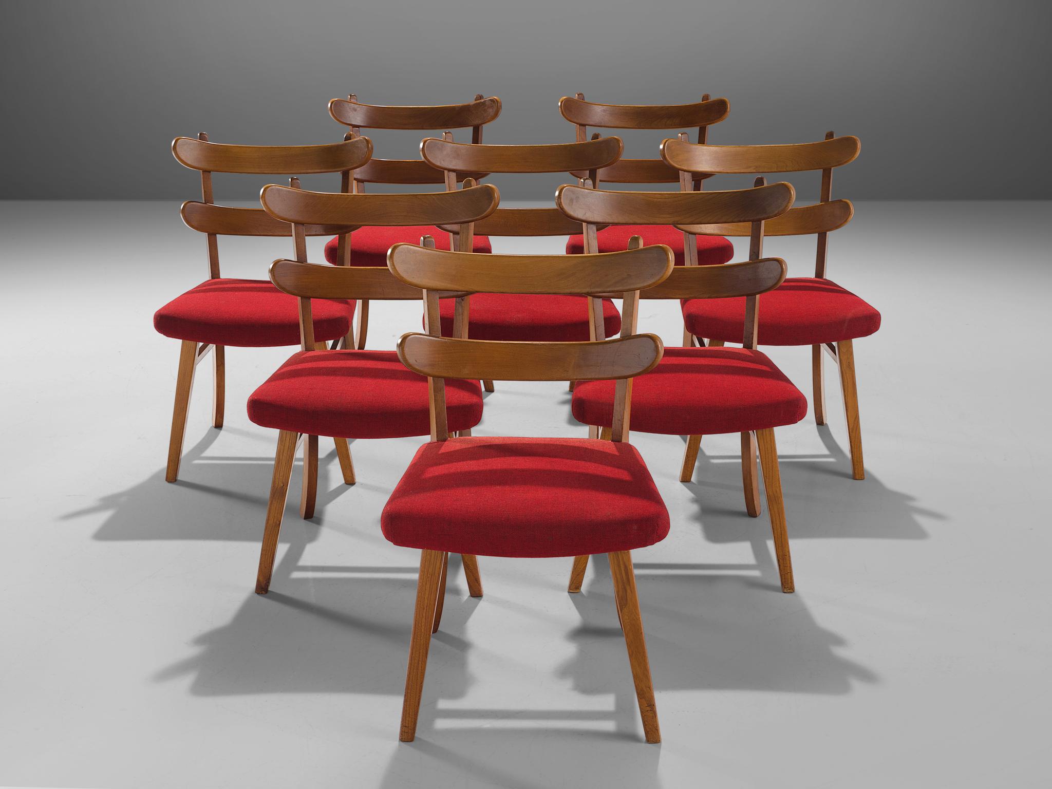 Set of eight dining chairs, elm, wool, Denmark, 1960s 

This set of eight dining chairs in elm features an upholstered red seat in wool. One distinctive trait of this Danish set are the thick curved elm slats that make the back of this chair. The