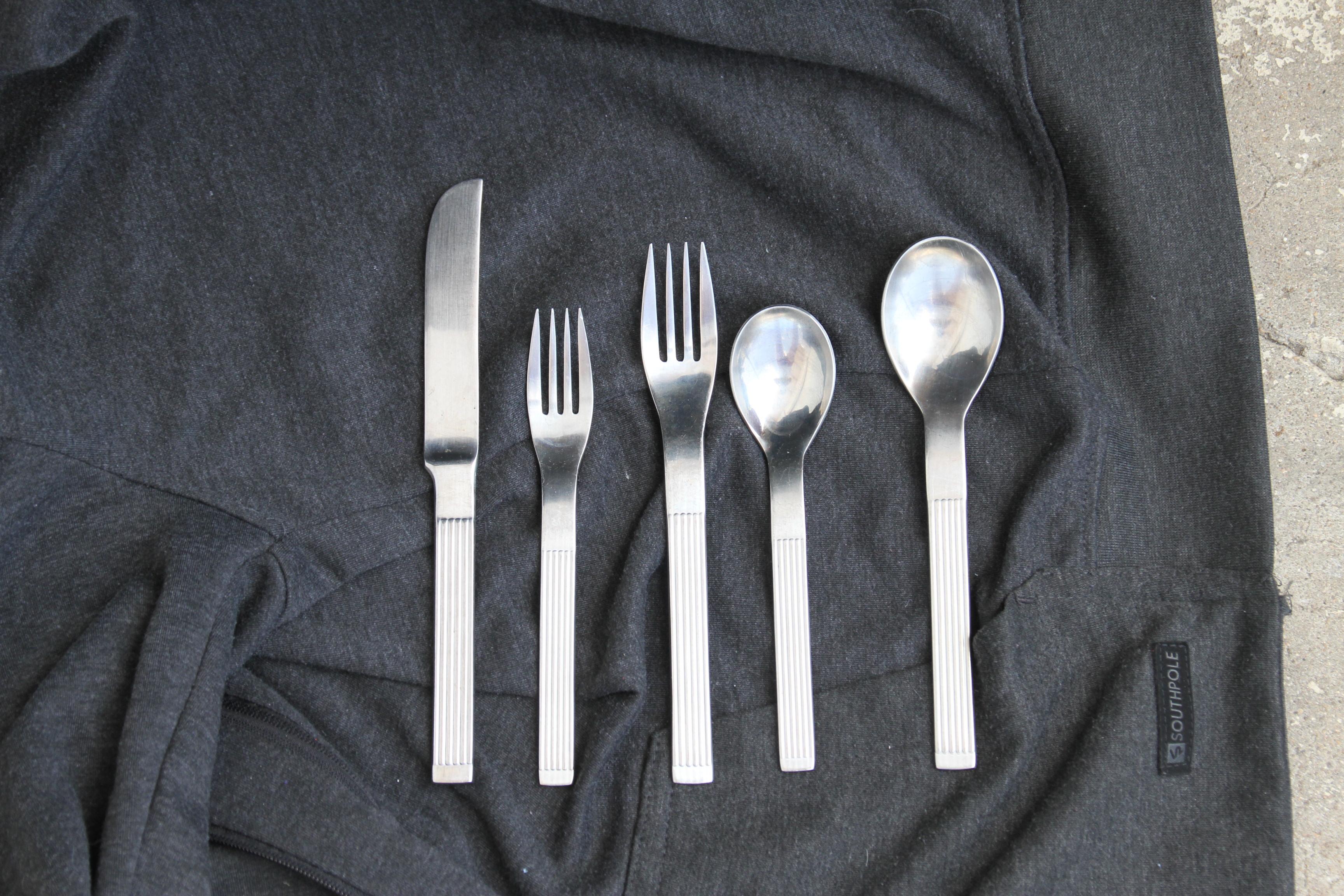 This is a nice set of Dansk flatware.
The set consist of (8) teaspoons
                              (8) tablespoons 
                              (8) knives
              .               (8) salad forks
                              (8) dinner