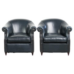 Conjunto de sillones club de piel de vacuno azul oscuro con un diseño único