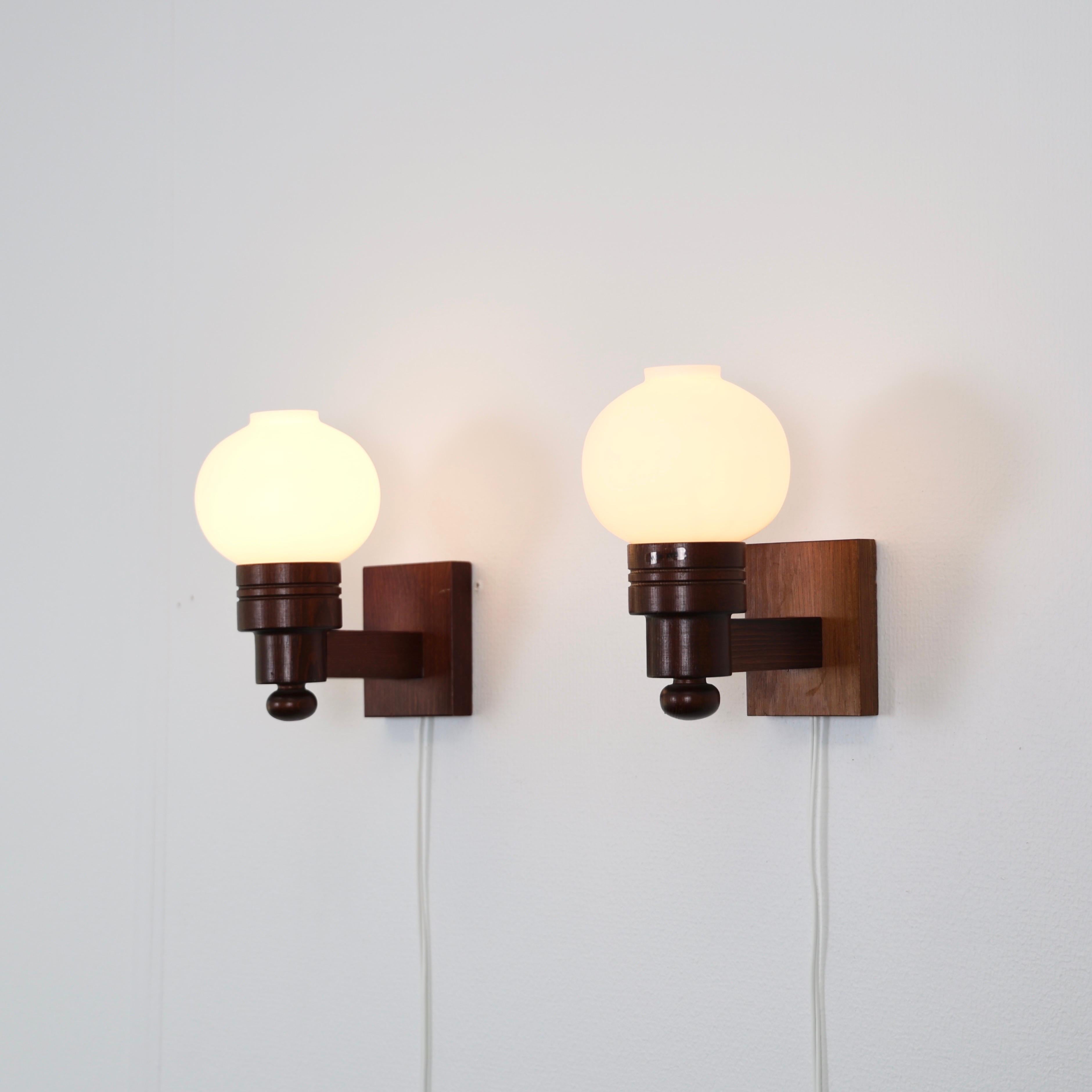 Scandinavian Modern Set of Dark Stained Pine Wood Wall Lamps by Aneta, Sweden, 1970s For Sale