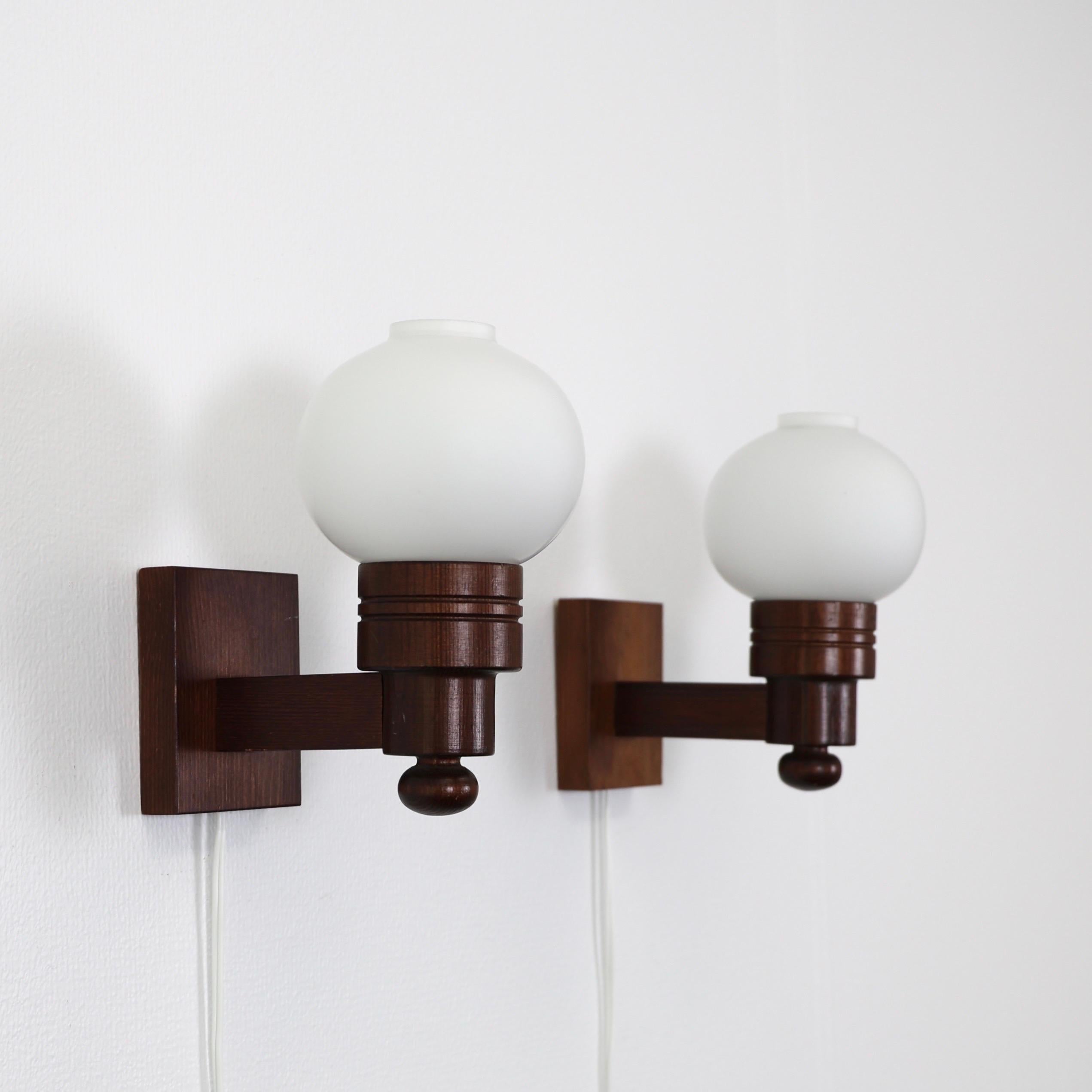 Glass Set of Dark Stained Pine Wood Wall Lamps by Aneta, Sweden, 1970s For Sale