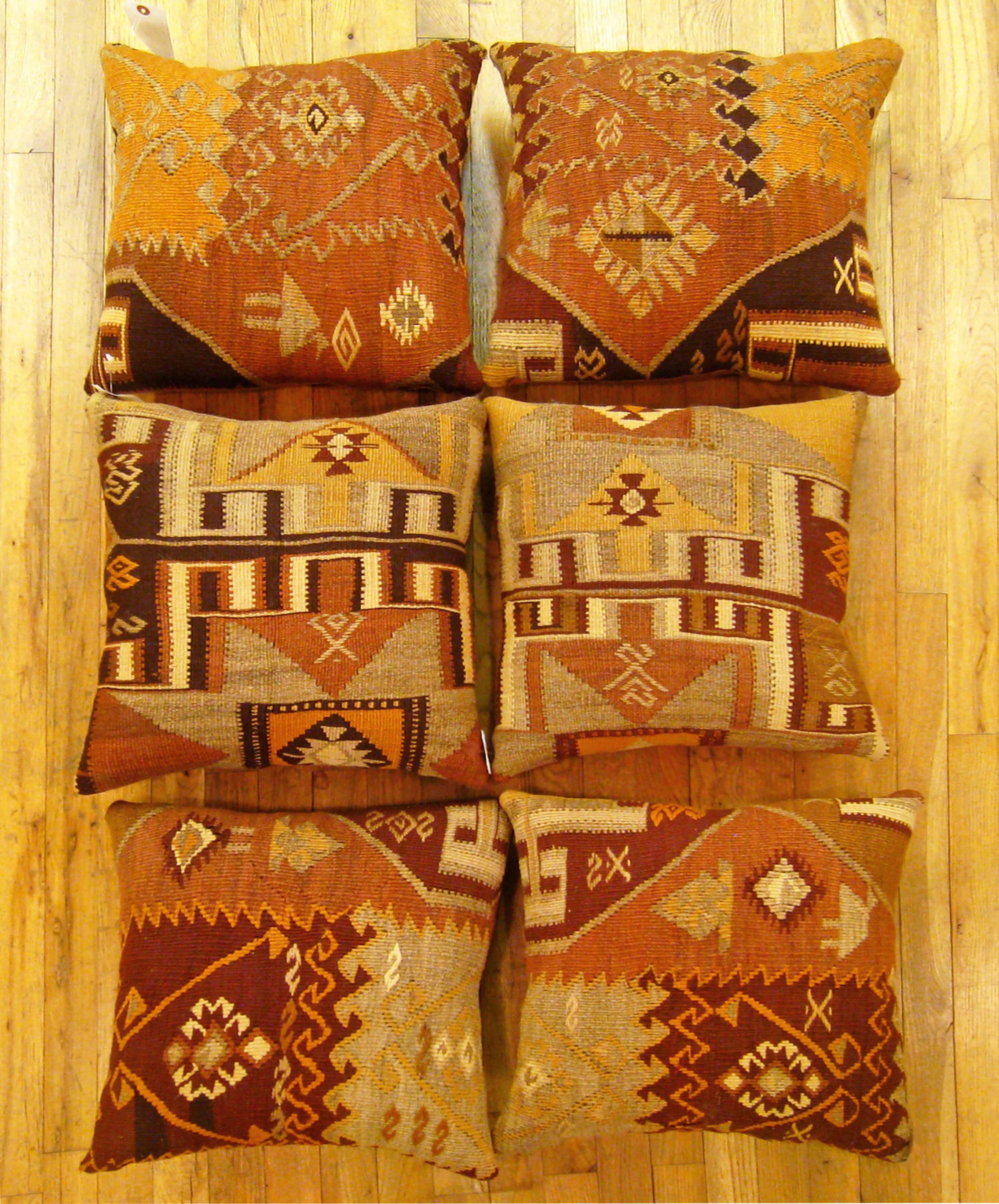A set of Vintage Turkish Kilim rug pillows; size 17