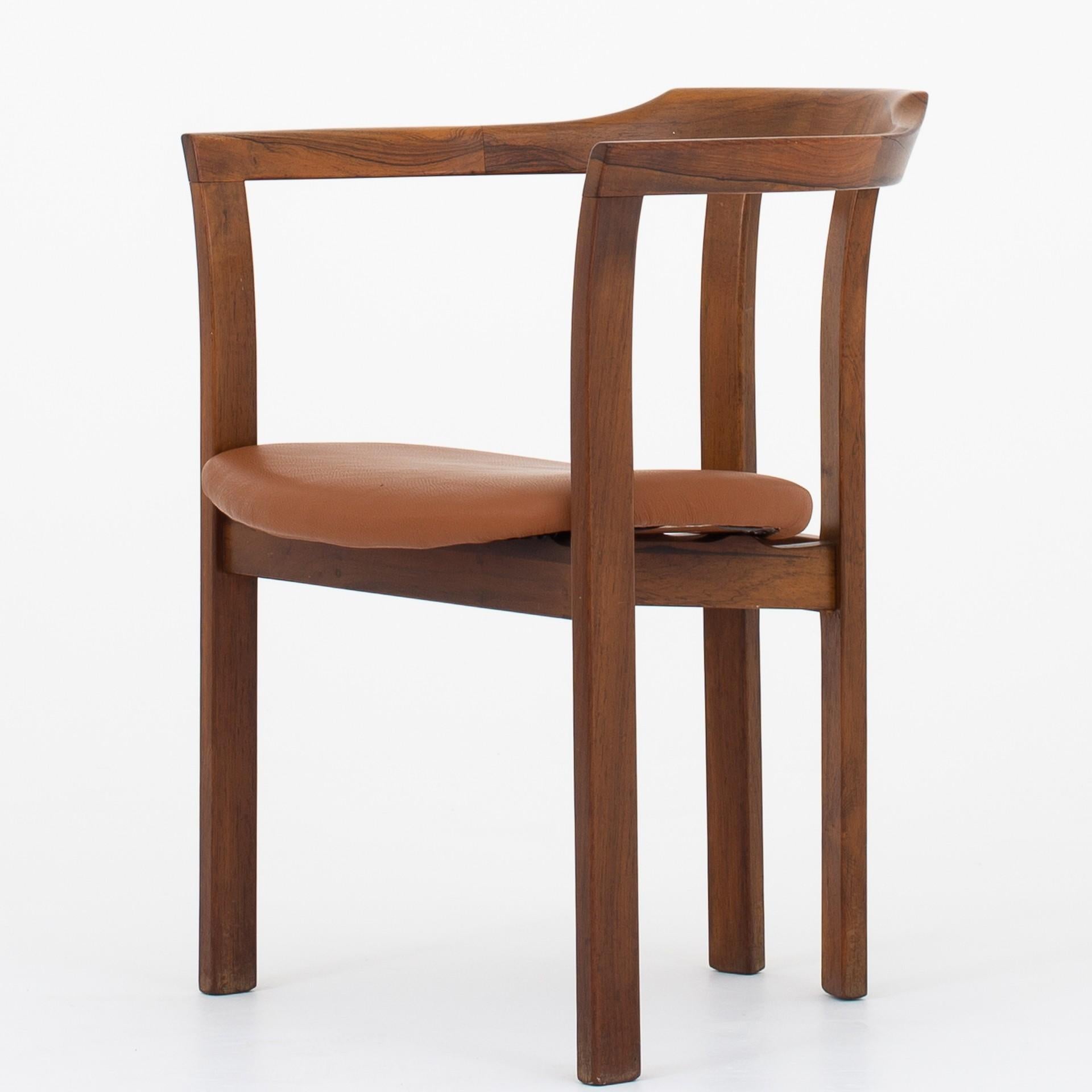 Set of four dining chairs in rosewood with light brown leather. Maker CS Møbler. Design 1966. Model 30.