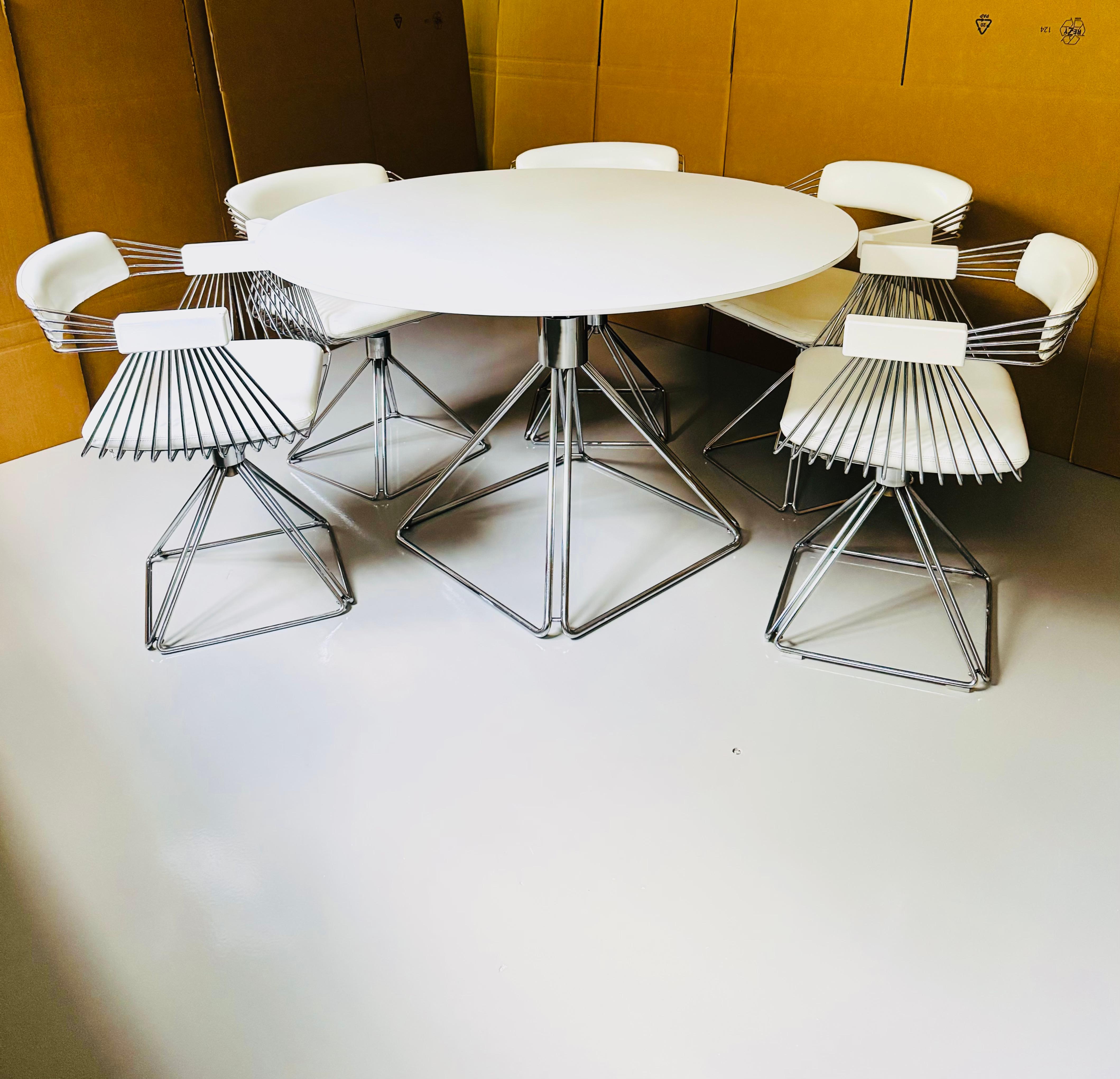 Stunning Belgian dining room set from the 1970s.
Exceptionally successful design and a real asset to any home.
The swivel chairs are comfortable and their angular design makes them a real eye-catcher.
The large round table offers plenty of space and