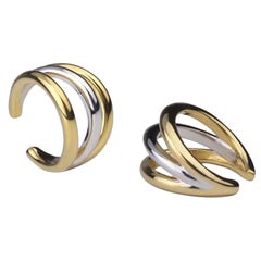 Set of Double color rhodium and gold Orbit ear cuffs by Cristina Ramella 
