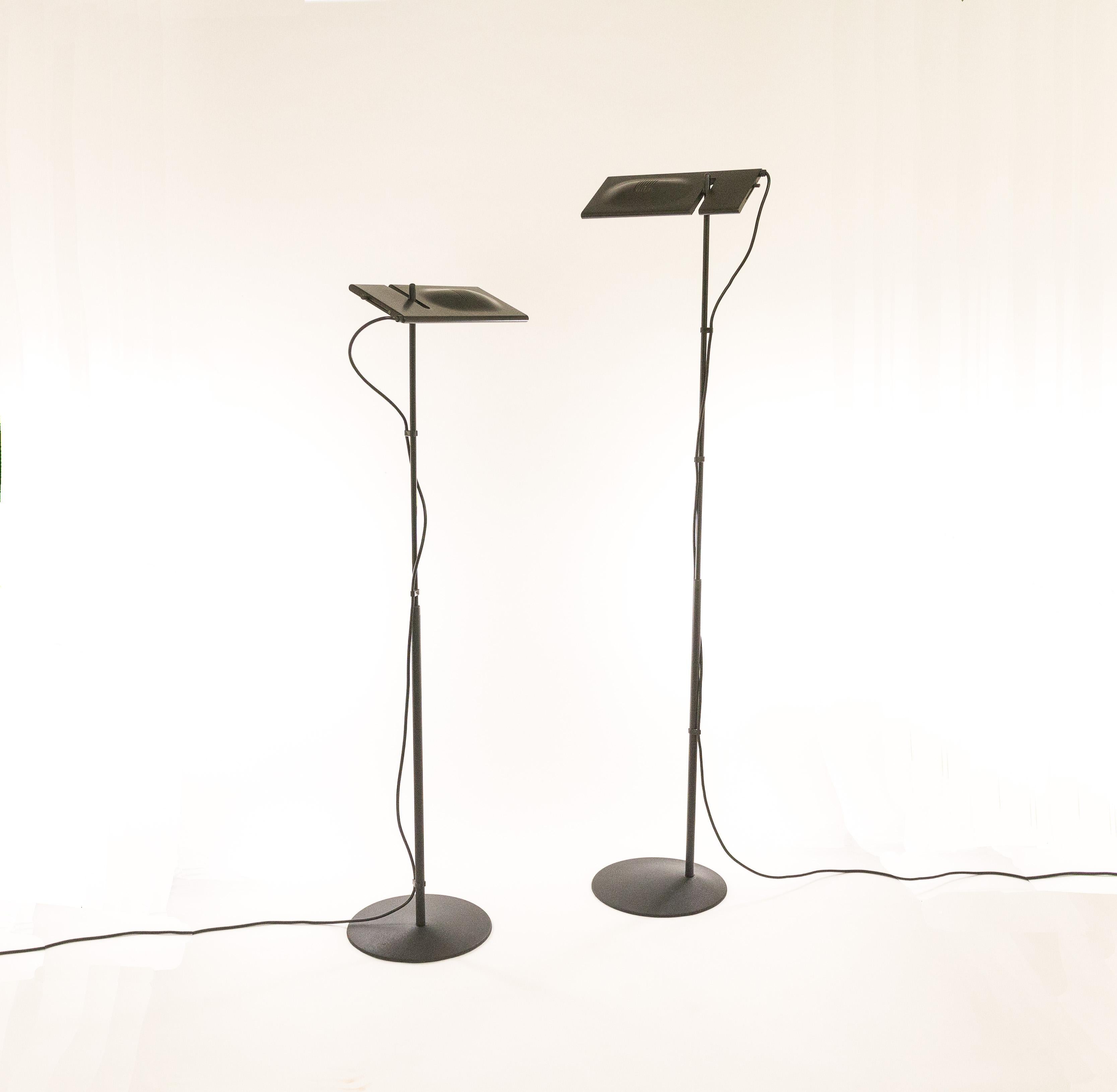 A pair of halogen floor lamps Duna designed by Mario Barbaglia and Marco Colombo for PAF Studio.

Noticeable details of this early edition: The height of both lamps can vary between 137 cm / 54 inch and 196 cm / 78 inch (!) and the rectangular
