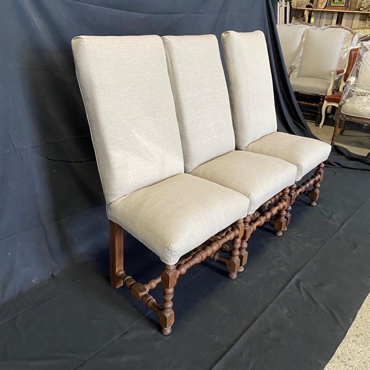 Wonderful set of three French Louis XIII walnut chairs with intricate turnery on the legs and stretchers, complemented by new neutral upholstery.
seat height 20

Note:  We have another identical set of 3, but they are 41.5 h (so a bit shorter)

#4981