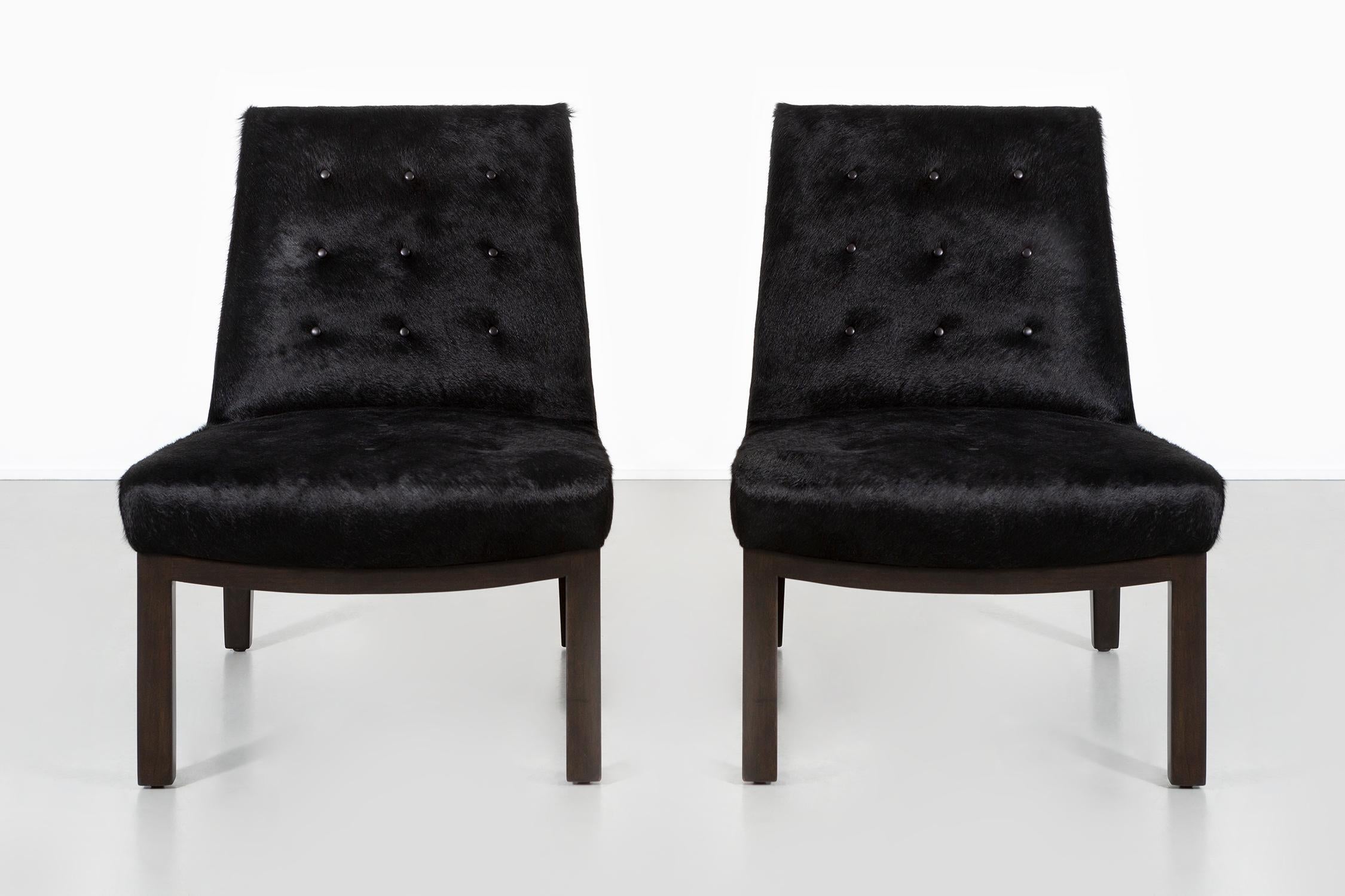 set of two slipper chairs

designed by Edward Wormley for Dunbar

USA, c 1950s

ebonized walnut + freshly reupholstered in Brazilian cowhide

32” h x 24” w x 28 ½” d x seat 15” h

sold as a set

fabric sample available upon