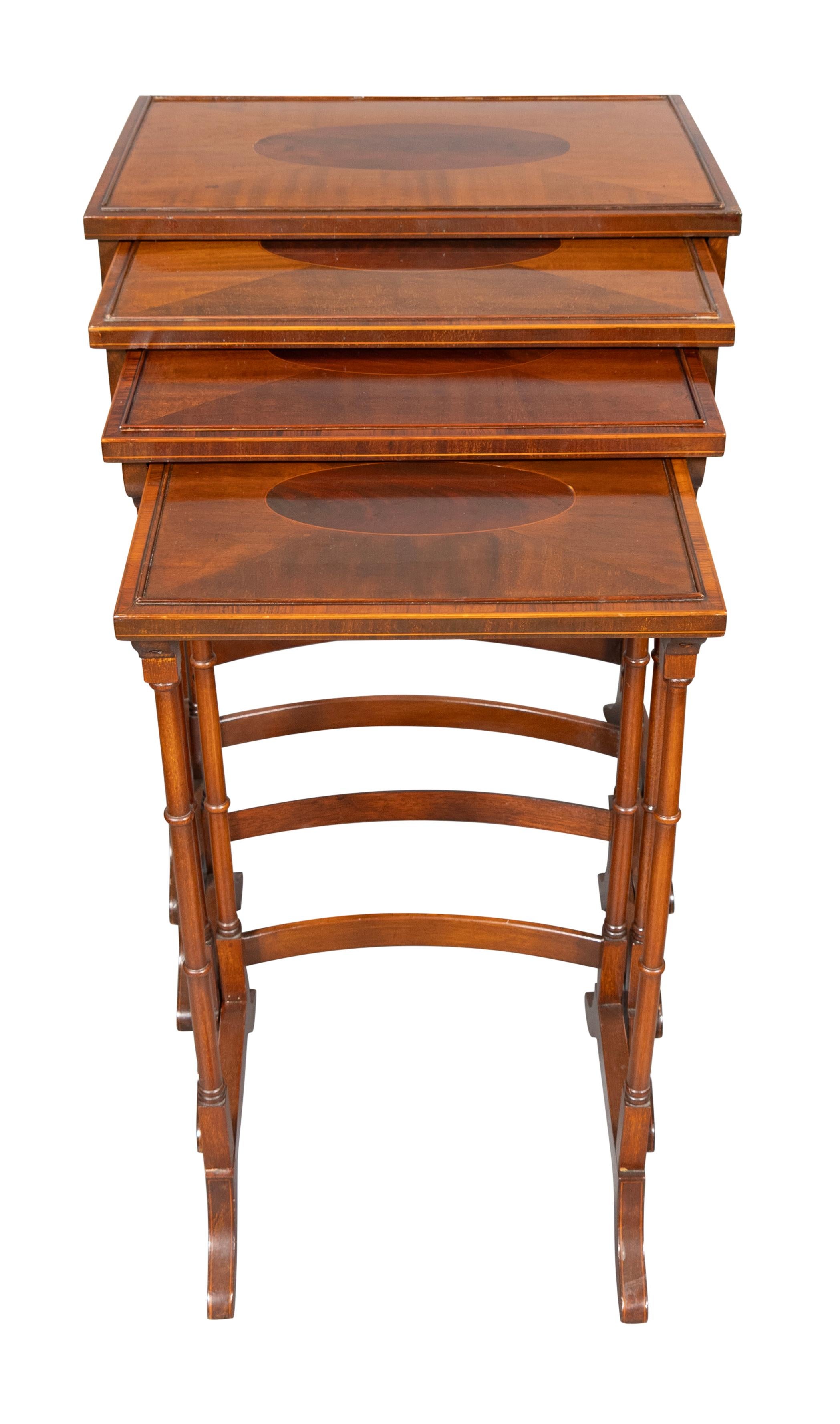 Each table with oval mahogany panel with satinwood border. Tables can be separated for use and can stack together. Make nice end tables.