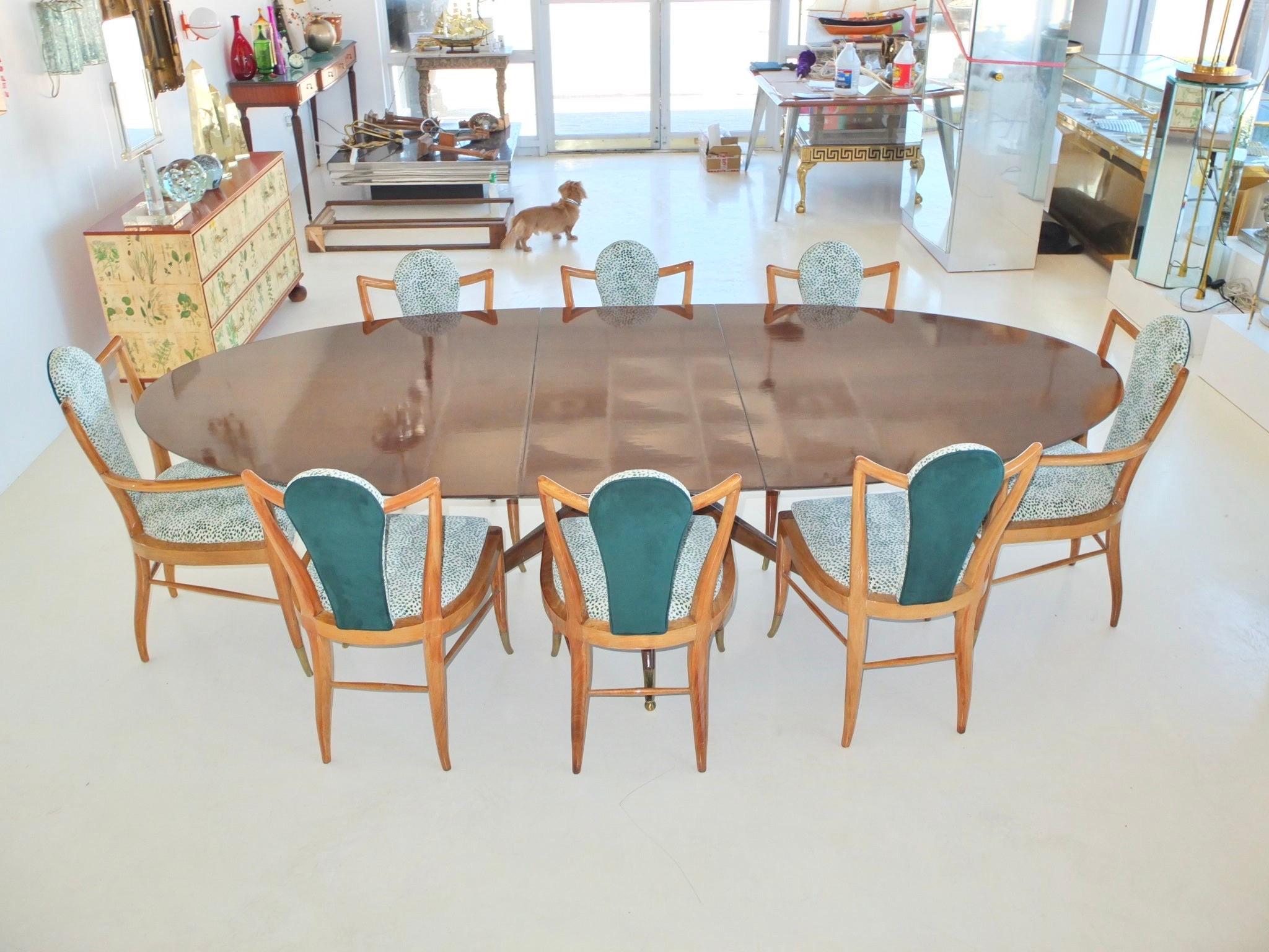 SINCE POSTING THIS LISTING WE HAVE ACQUIRED AN ADDITIONAL SET OF EIGHT CHAIRS FOR A TOTAL OF 16. The second set is in a darker finish but all can be refinished to match or simply use as a contrasting set.

Sculptural dining chairs with strong lines