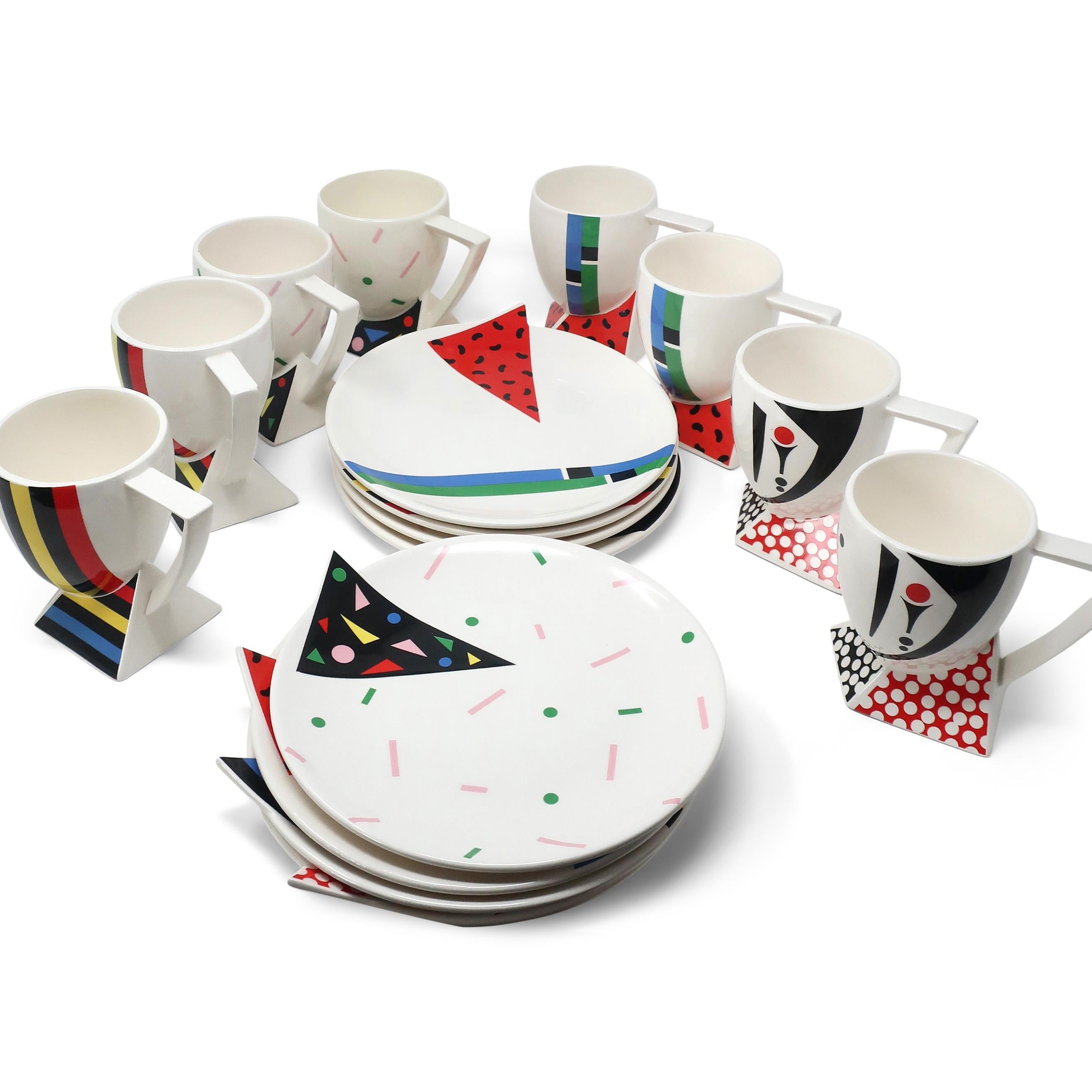 A set of eight ceramic mugs and eight ceramic plates in the Alpha 3 pattern for Kato Kogei's Fujimori Collection. As Art Director for Kato Kogei Ceramics, Fujimori oversaw the design and distribution of his signature line. These pieces are perfect