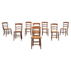 Set of Eight 19th Century French Provincial Fruitwood Bistro Chairs