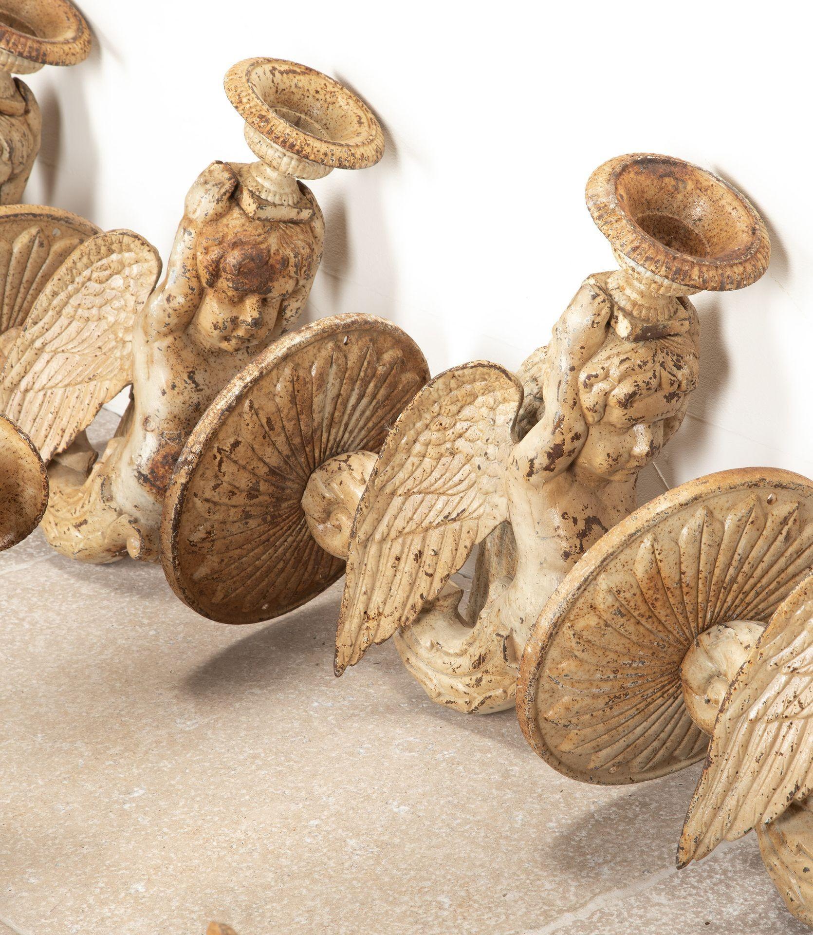 Set of eight 19th Century Italian cast iron cherub candle sconces.
With a rustic patina.
Circa 1890.