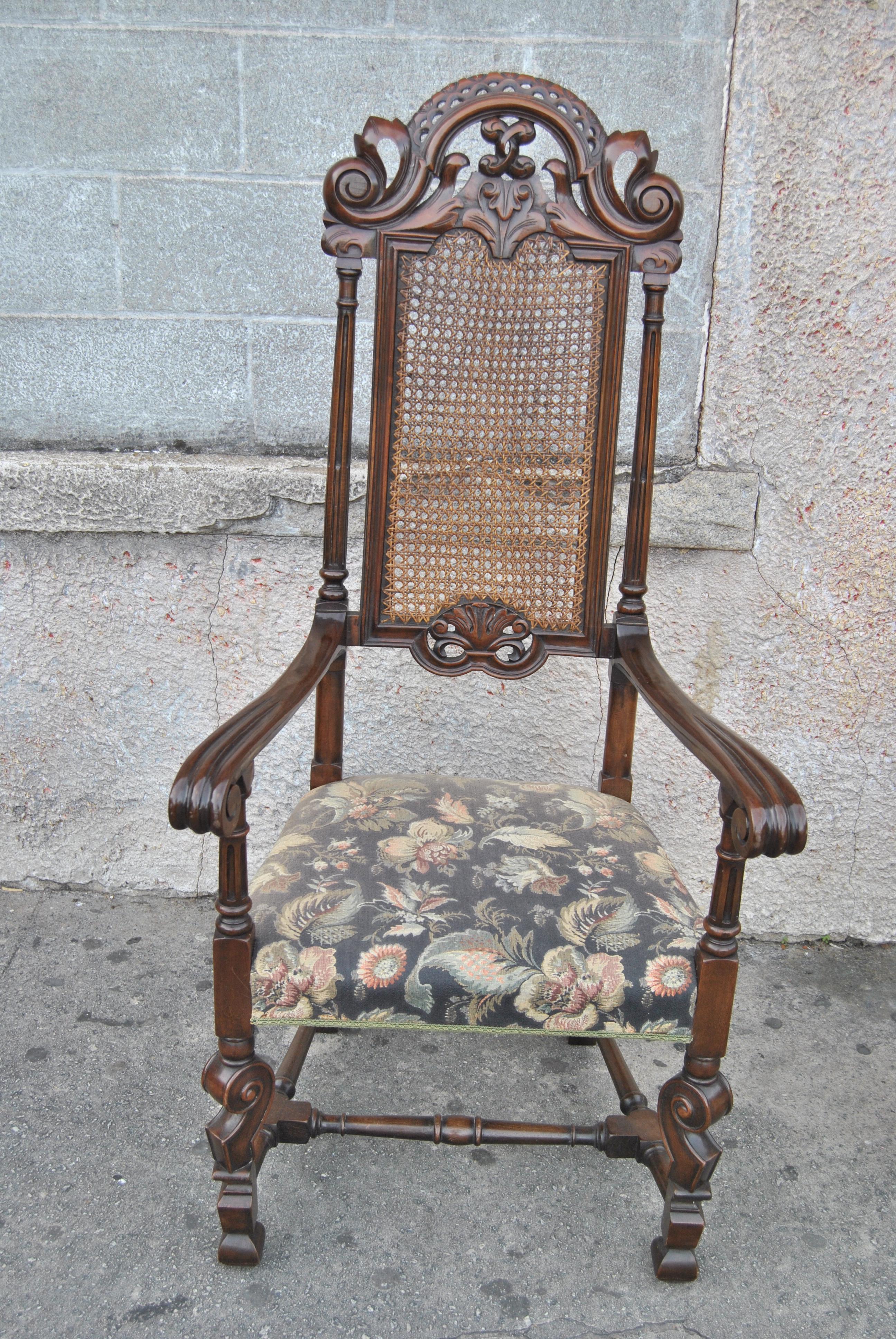 This is a matched set of eight walnut chairs consisting of 2 arms and 6 sides. The chairs were made in England, circa 1880. They are in the William and Mary style. They have a beautifully shaped crest to the top of each chair that has fantastic