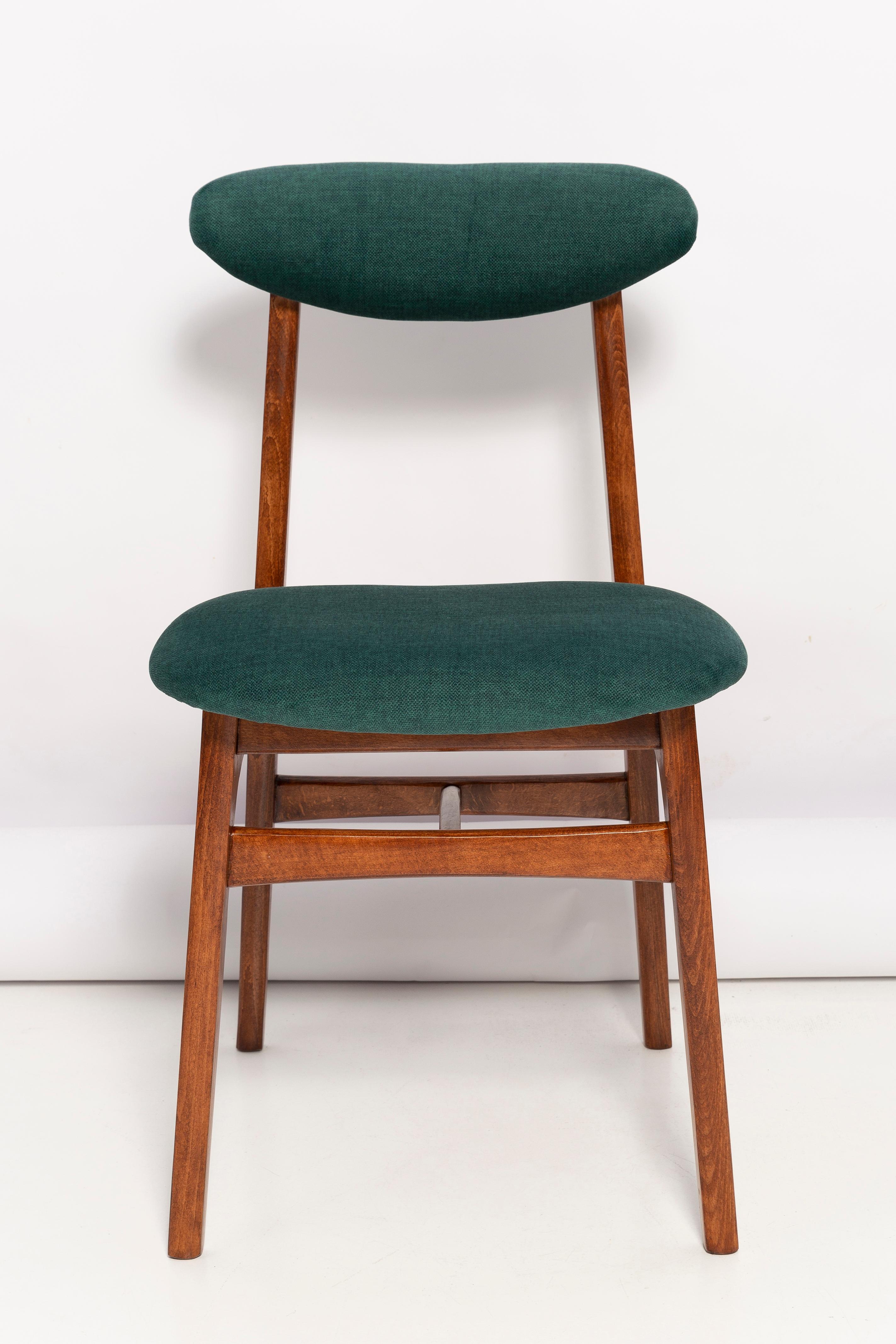 Chairs designed by prof. Rajmund Halas. They have been made of beechwood. They have undergone a complete upholstery renovation, the woodwork has been refreshed. Seats and backs were dressed in a dark green, durable and pleasant to the touch velvet