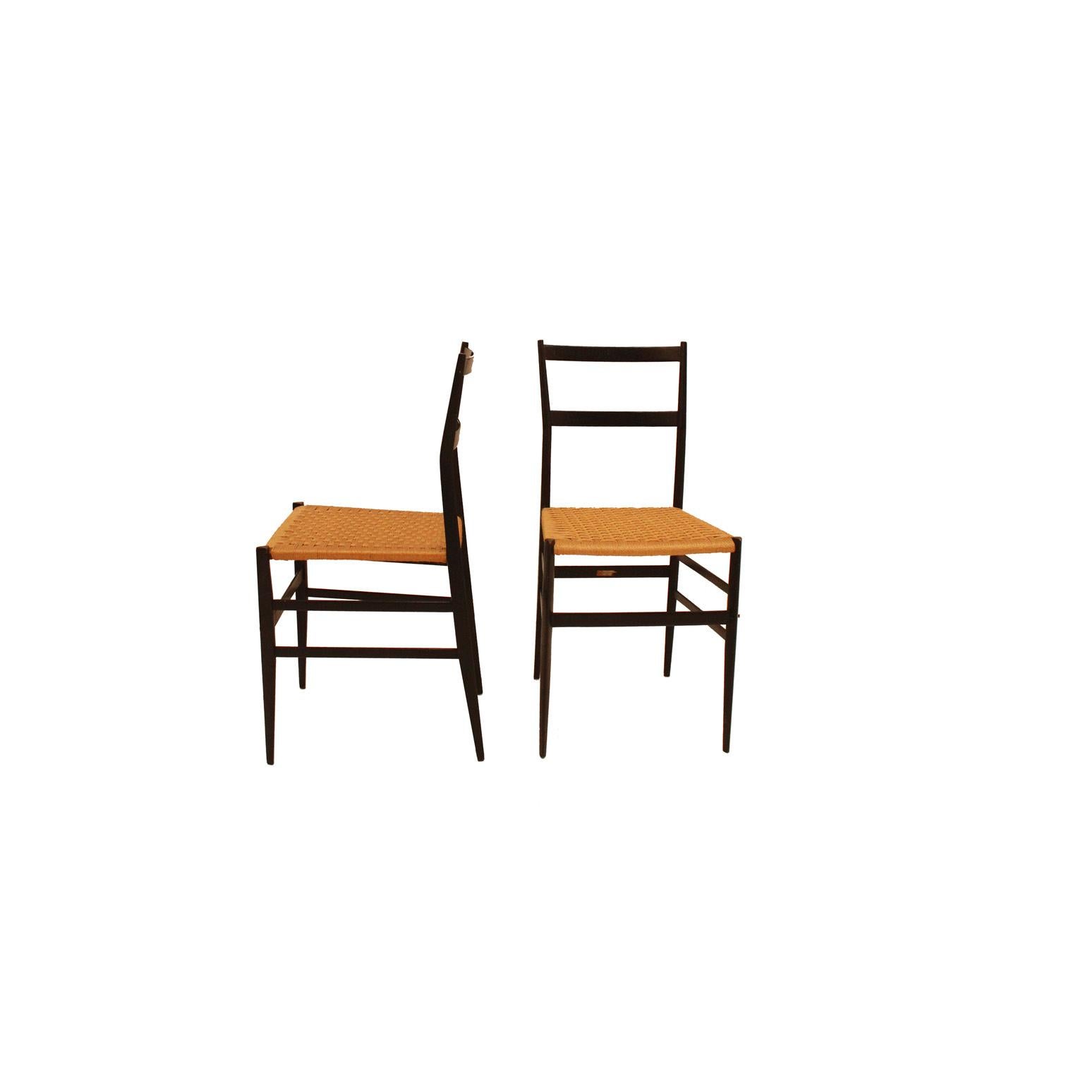 Set of eight chairs mod. Superleggera designed by Gio Ponti for Figli Di Amadeo Cassina. Made of solid ash wood and rattan. Italy 1957. Its construction challenge is contained in the triangular section of the legs, only 18 millimeters and with a